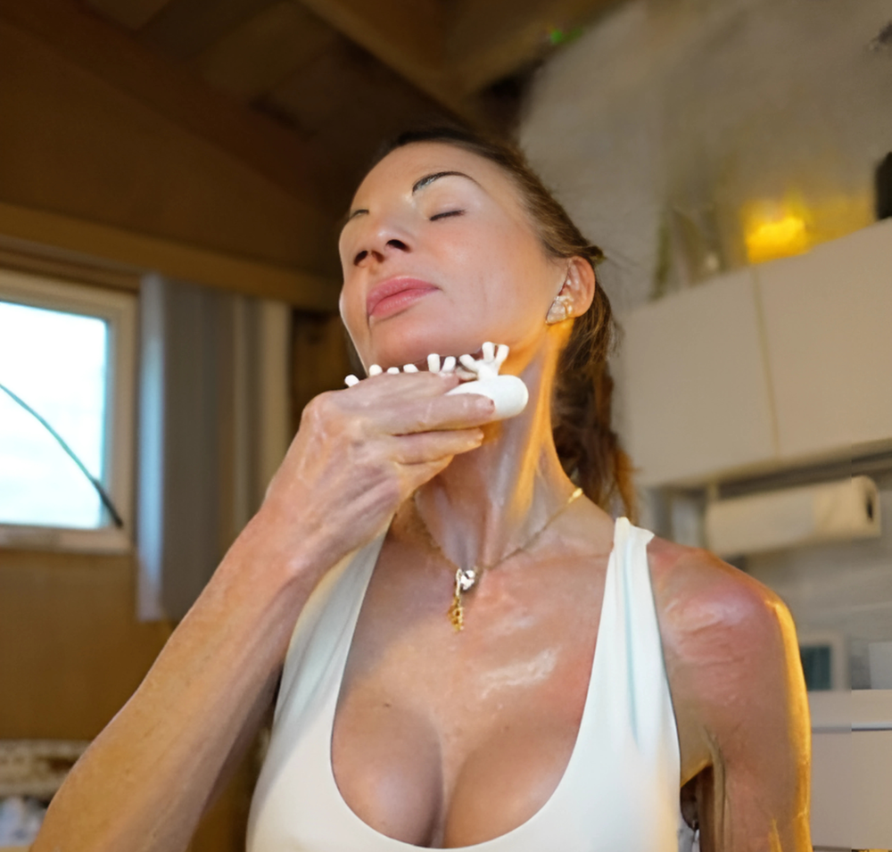 Tamara Renee demonstrating a fascia technique for the neck