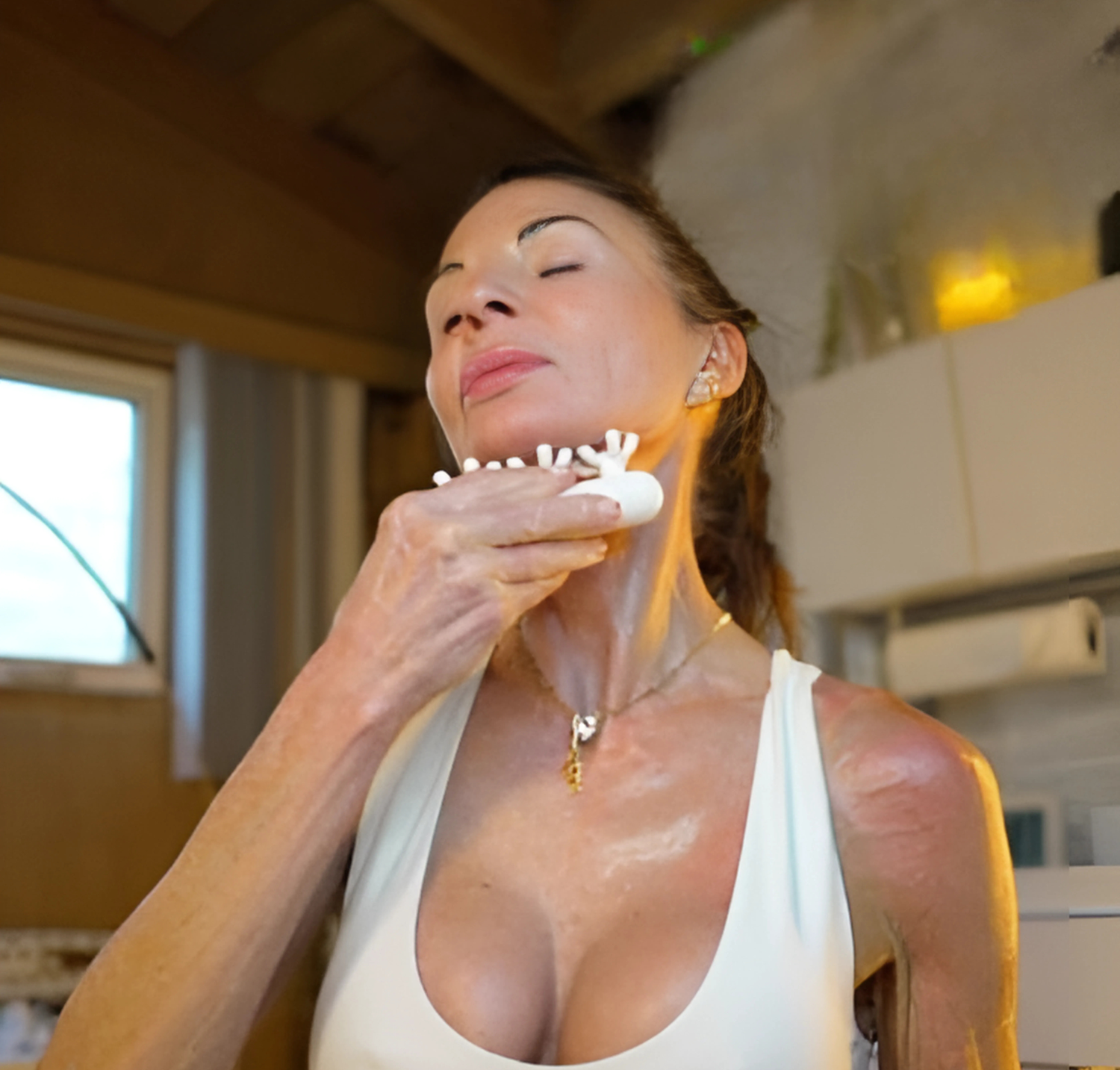 Tamara Renee demonstrating a gentle fascia technique for the neck
