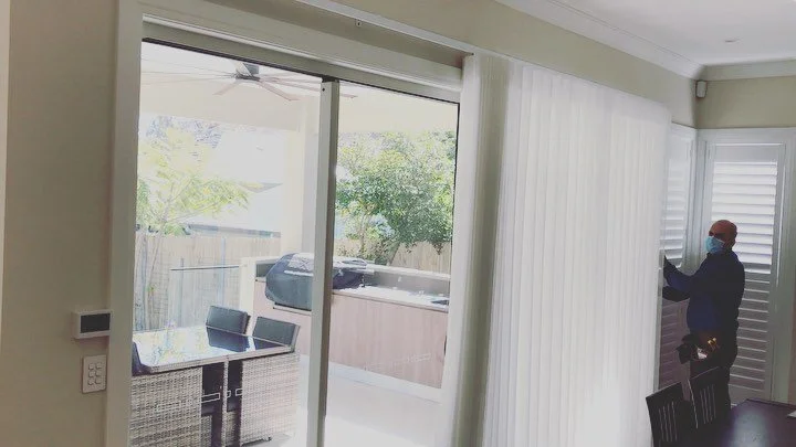 @verishades blinds covering big sliding doors.