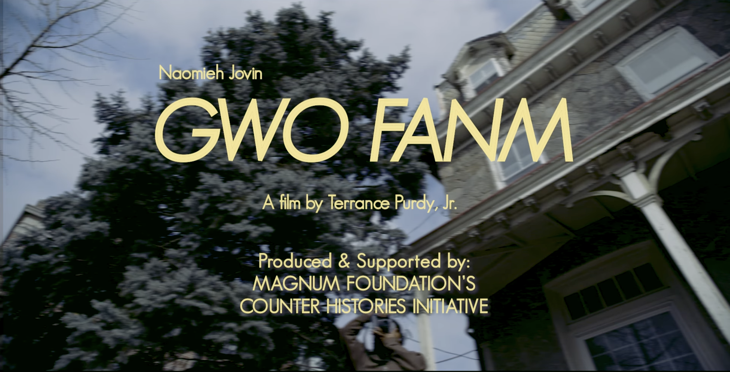Title screen of a film titled "GWO FANM" by Naomieh Jovin, directed by Terrance Purdy, Jr., supported by Magnum Foundation's Counter Histories Initiative, set against a background of a house with a large tree.