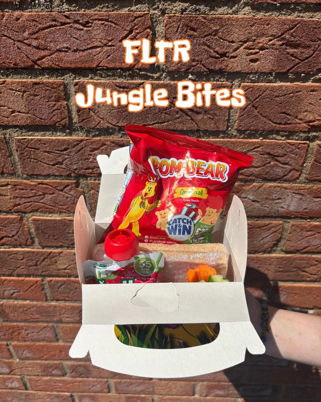 🐵🌿 Introducing our FLTR Jungle Bites! 🌿🐵
Available from Monday, 13th July!

The perfect grab-and-go lunch for little adventurers.

Each Jungle Bites box includes:
🥪 White sandwich (Cheese, Ham or Jam)
🥒 Carrot &amp; Cucumber sticks
🧸 Bear YoYo