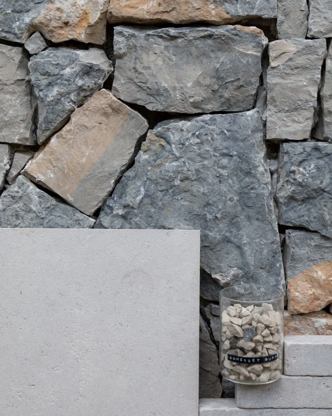 Happy Monday! 

Today's moodboard showcases a mix of warm and cold tones with our Zahra Beige Etched Paving and Stackers and Somerset Buff Chippings, paired with Annecy Cladding. 🩶 

If you're interested in any of these products, you can head to our