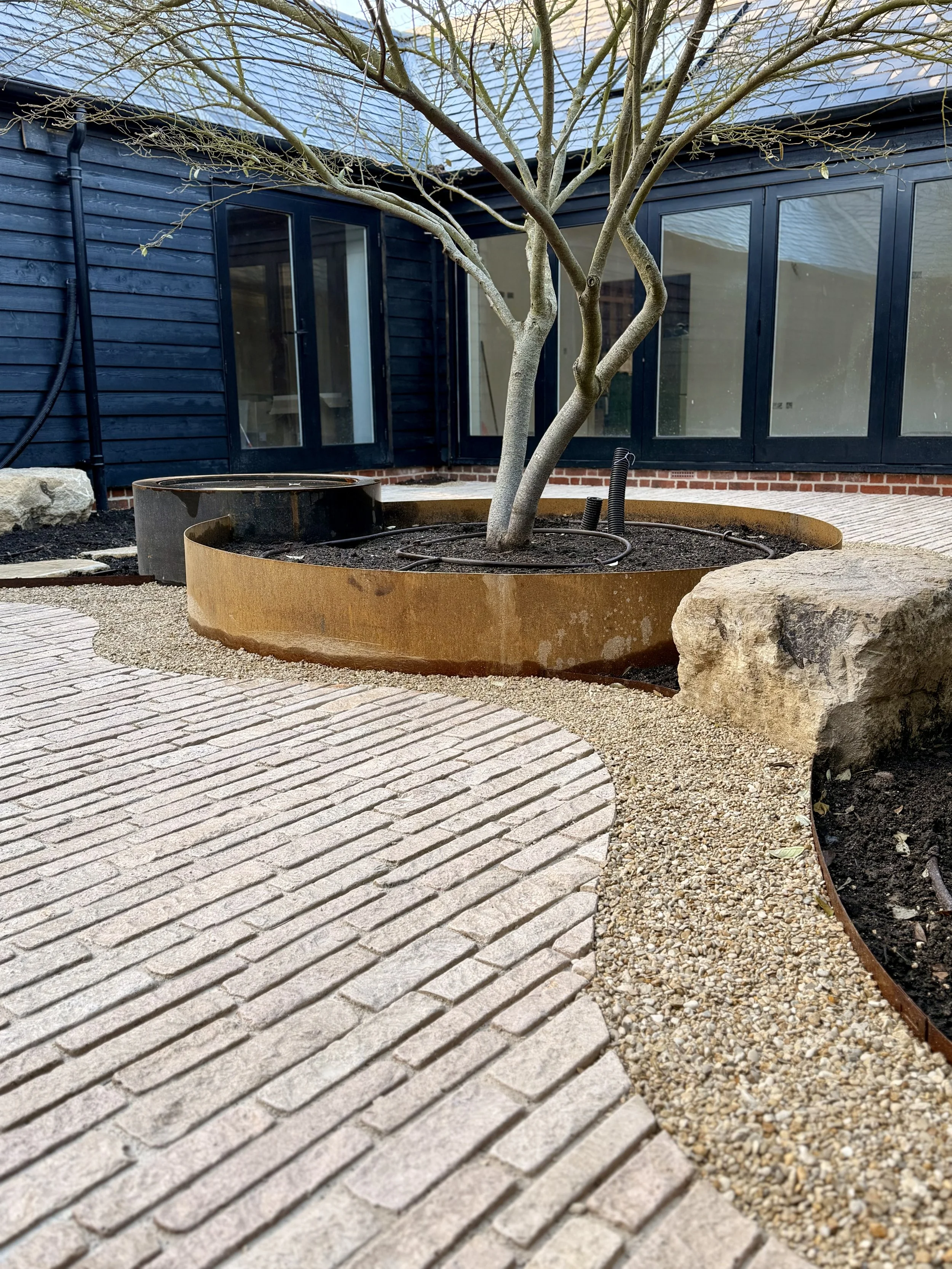  Products:  Zahra Beige Pitchers  and  10mm Cotswold Pebble  