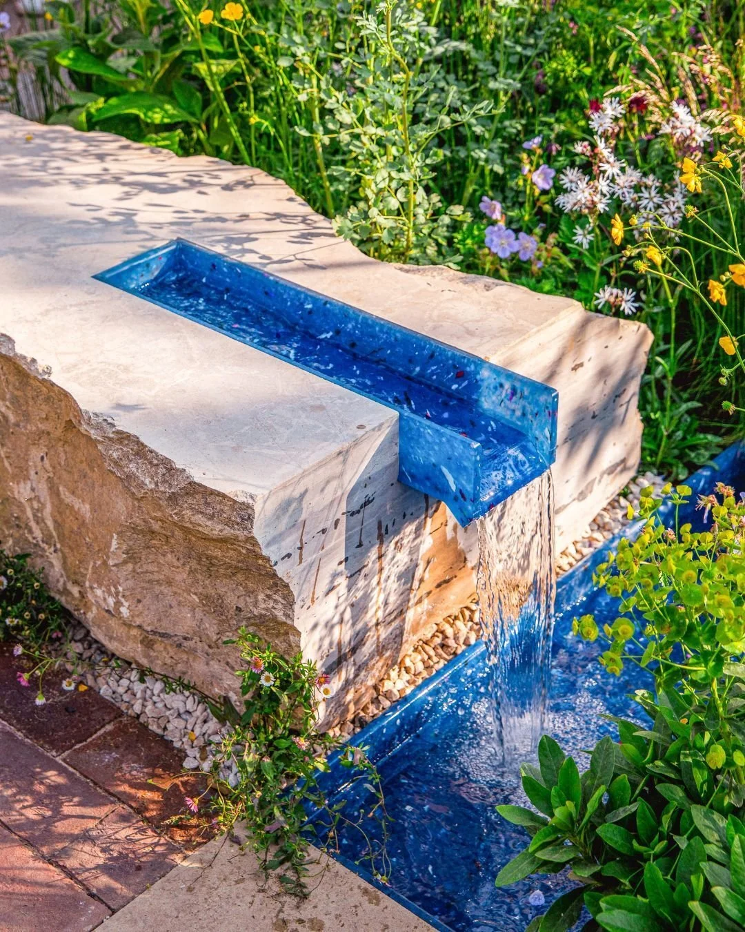 This is the RSPCA Garden, Silver Gilt medal winner from Chelsea Flower Show 2023 🥈 🌿

This gorgeous garden showcases our beautiful Langton Boulder, featuring a rill made using only recycled plastics.

Credits
Designed by @wilsonassociatesdesign
Bui