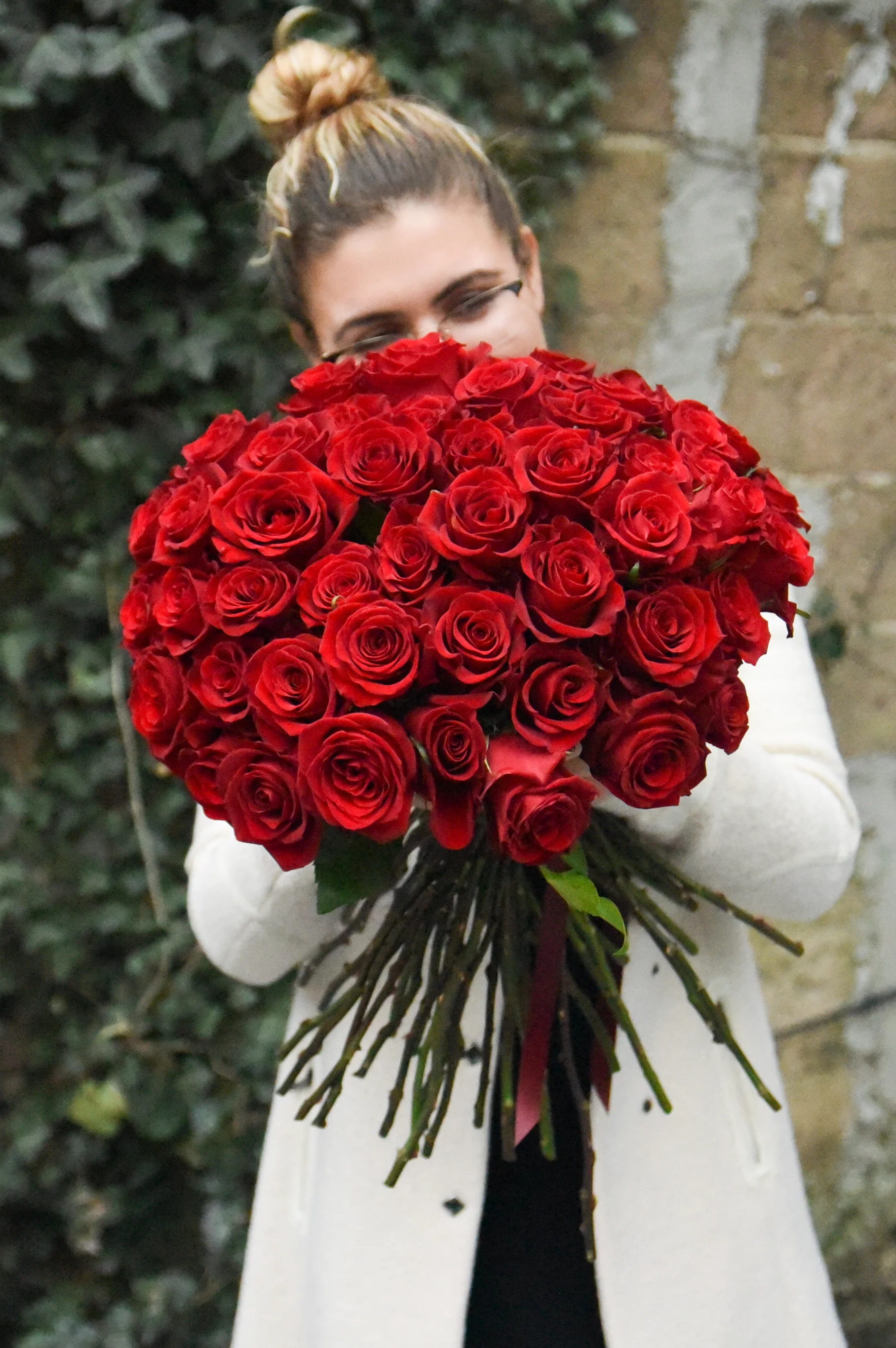 huge valentine's day bouquet filled with 5 dozen roses. Giant bouquet.