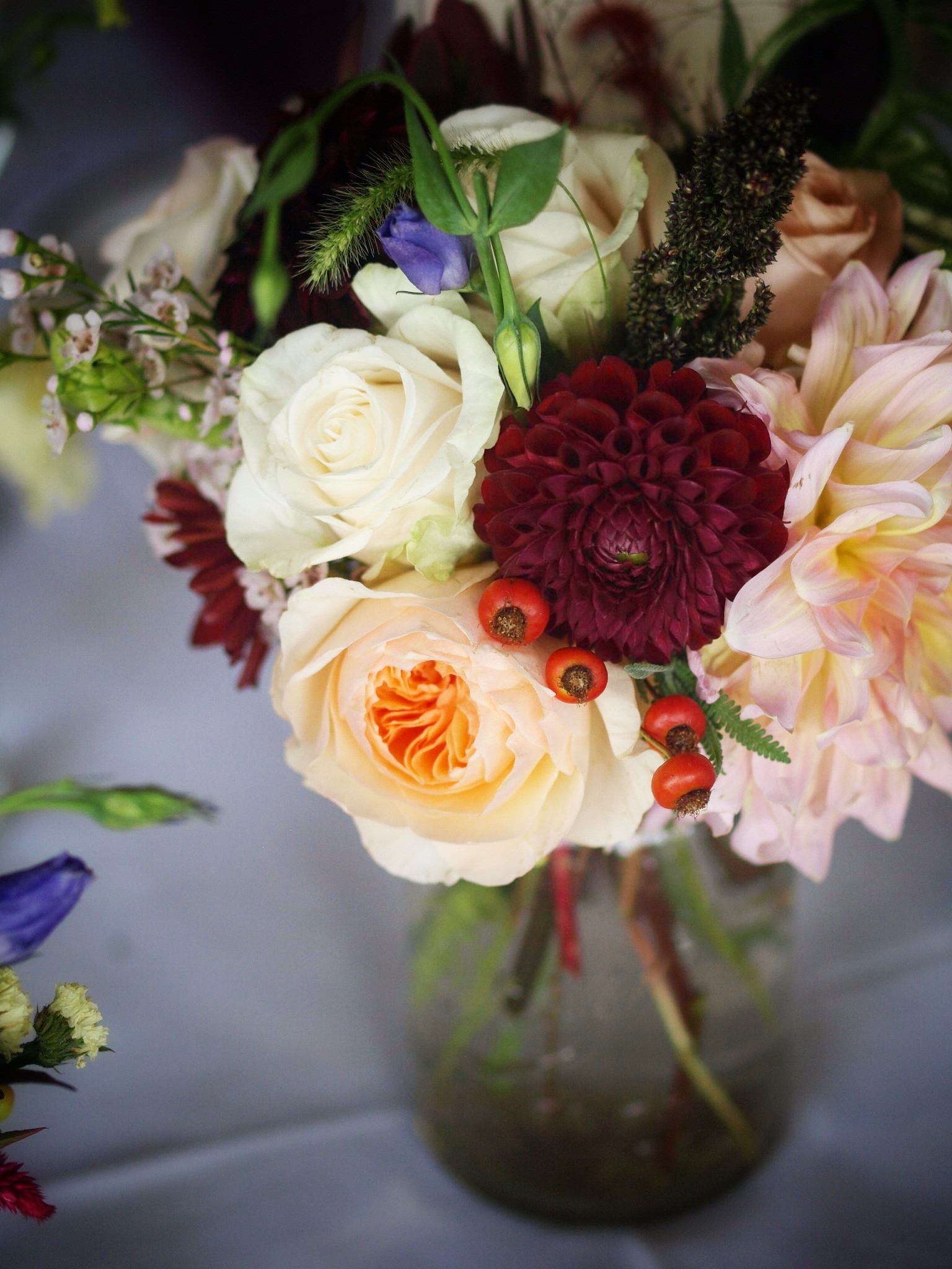 Oreonta house woodstock wedding mason jar centerpiece with garden rose dahlia and wildflowers.jpg