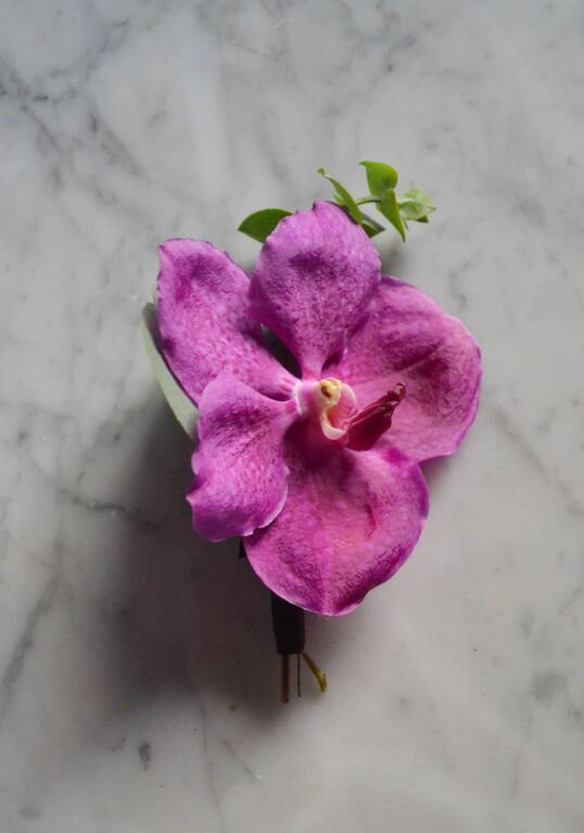 Purple orchid boutineer.  Rosehip Social, Brooklyn, NY.