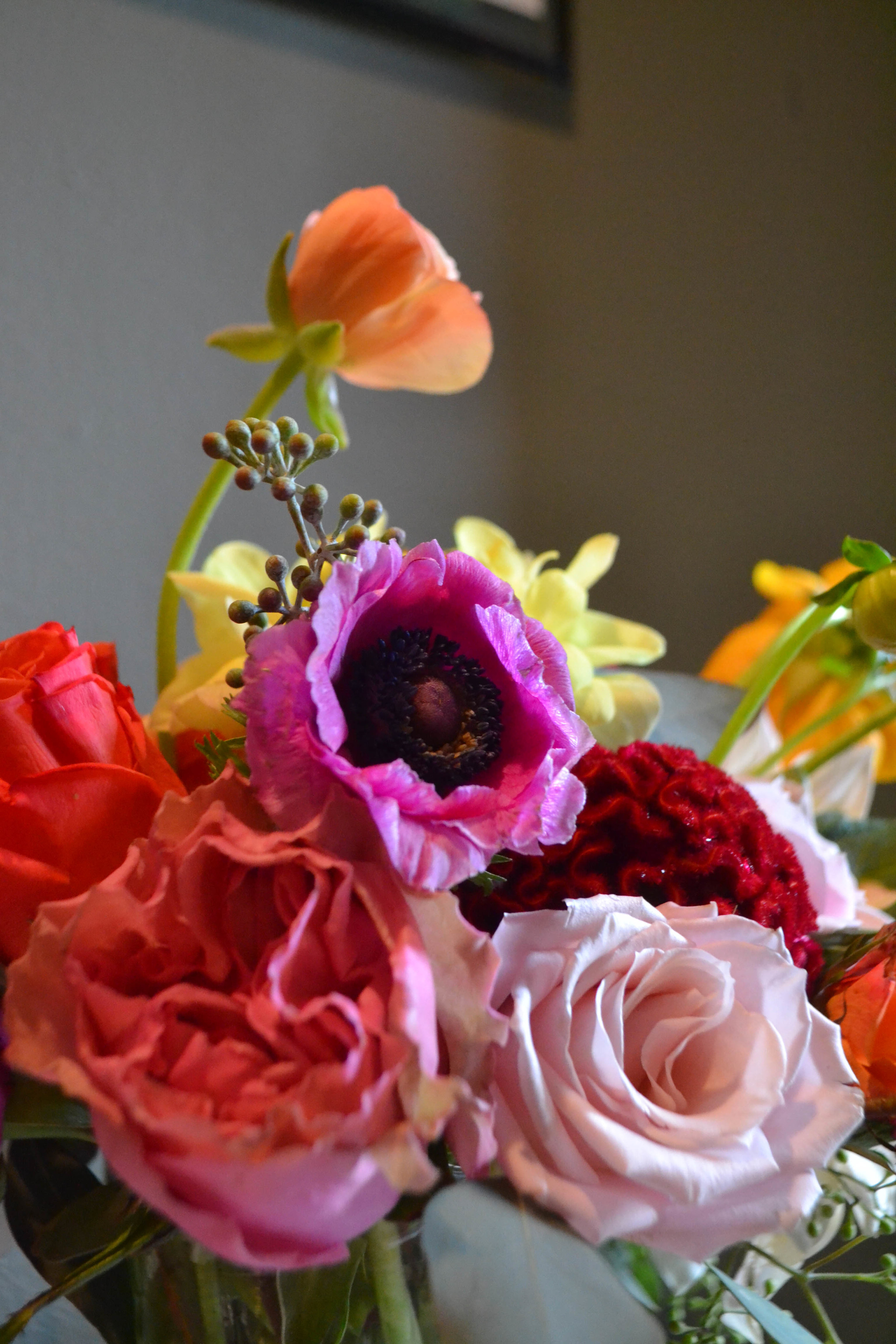 Colorful and romantic flower compote centerpiece closeup. Catskills wedding.