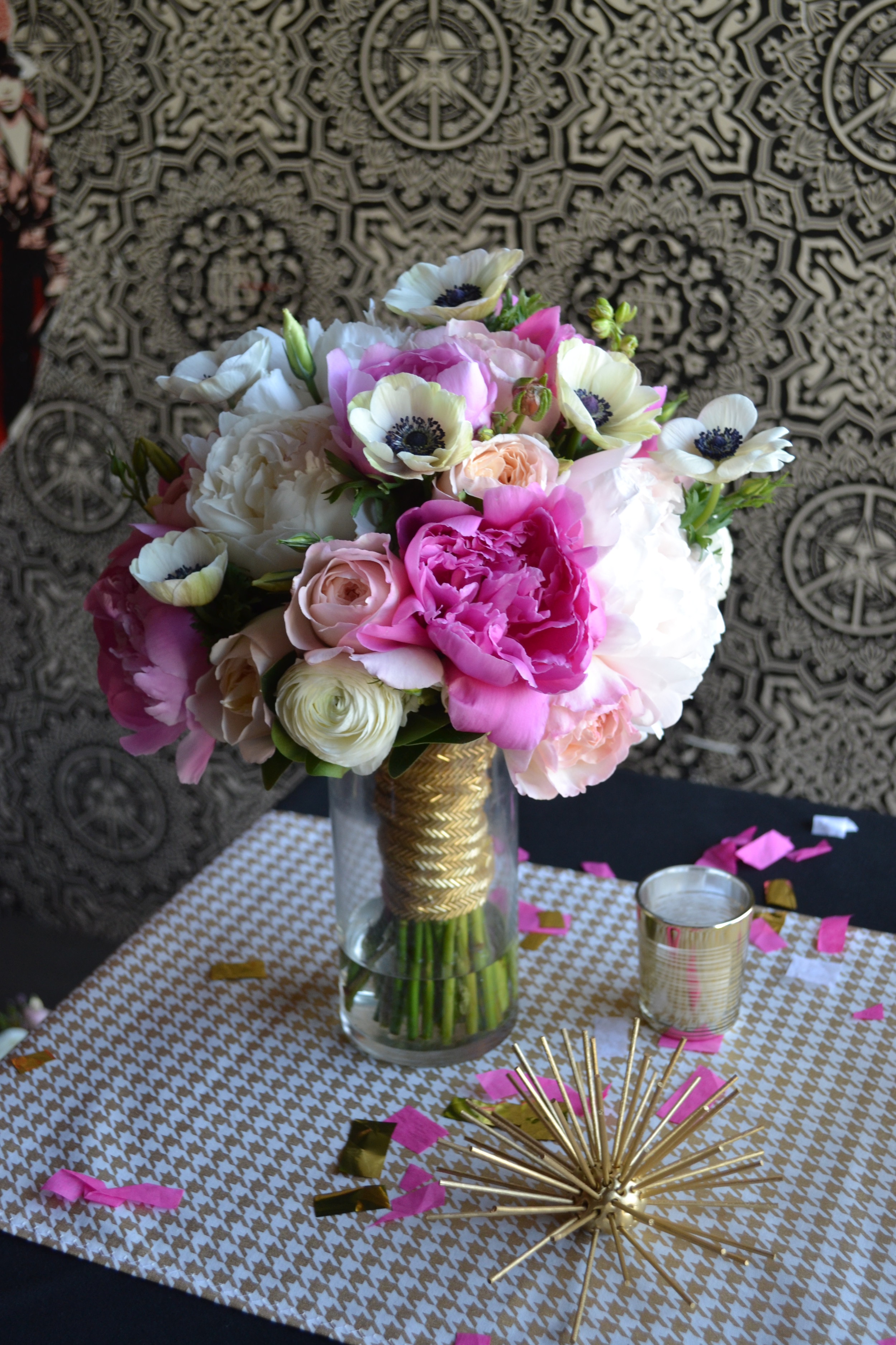 Bridal bouquet of pink and white radunculus and anemones.  Rosehip Social, Brooklyn, NY.