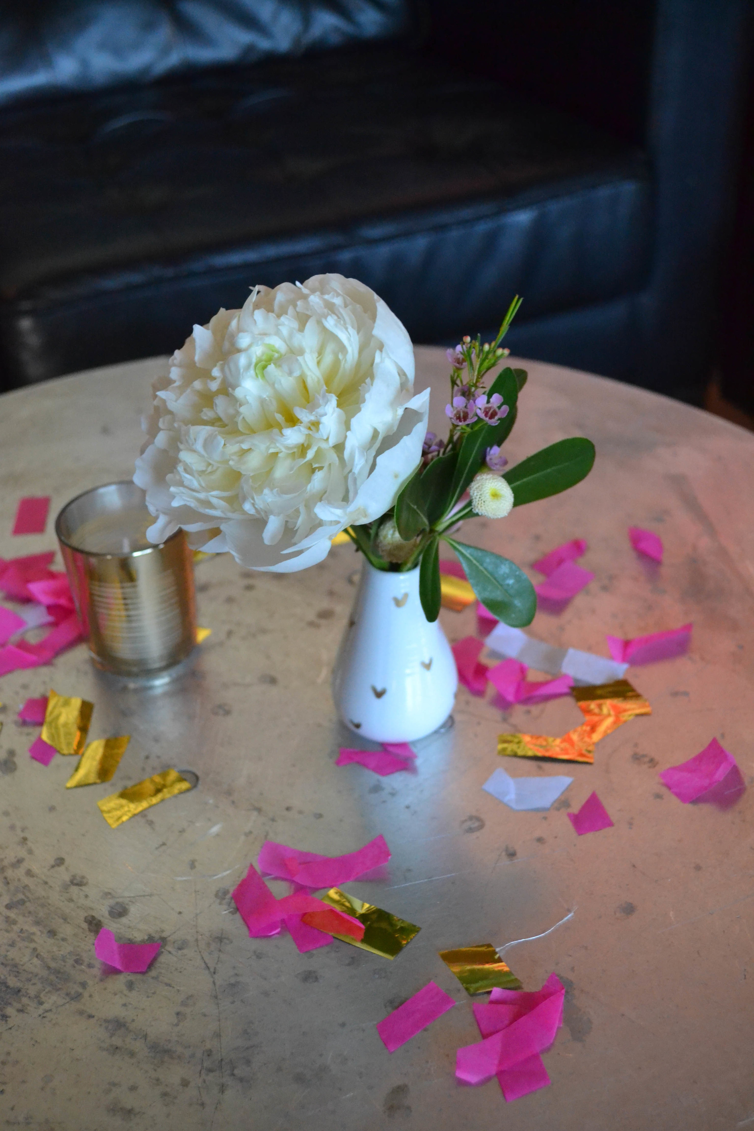 White bud vase arrangement in white ceramic vase.  Rosehip Social, Brooklyn, NY.