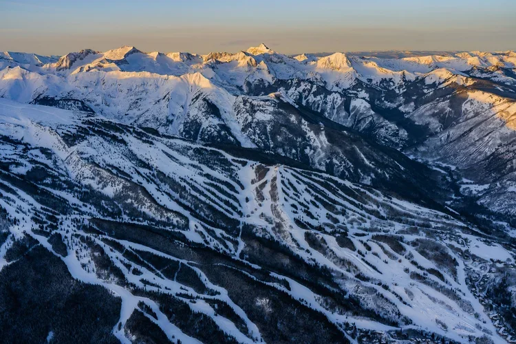 First light over Snowmass and the Elks