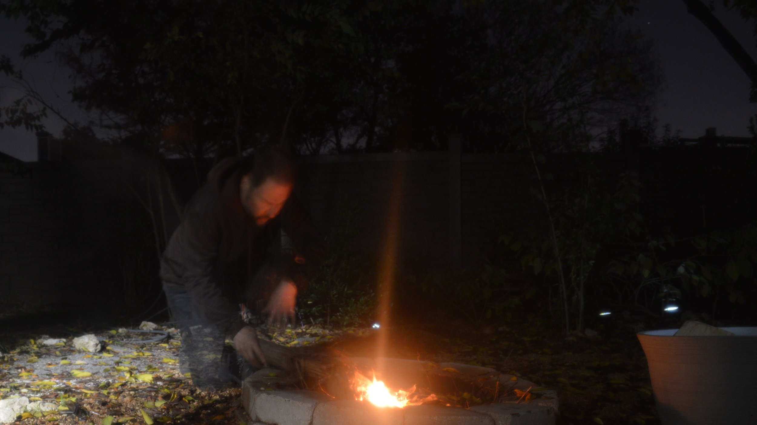 I accelerate the aging process further by weathering or a controlled burn.