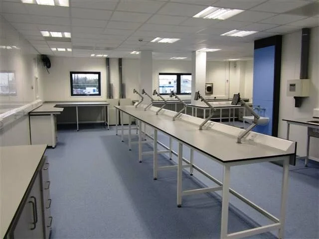 Adjustable monitor arms can be installed to laboratory benching.