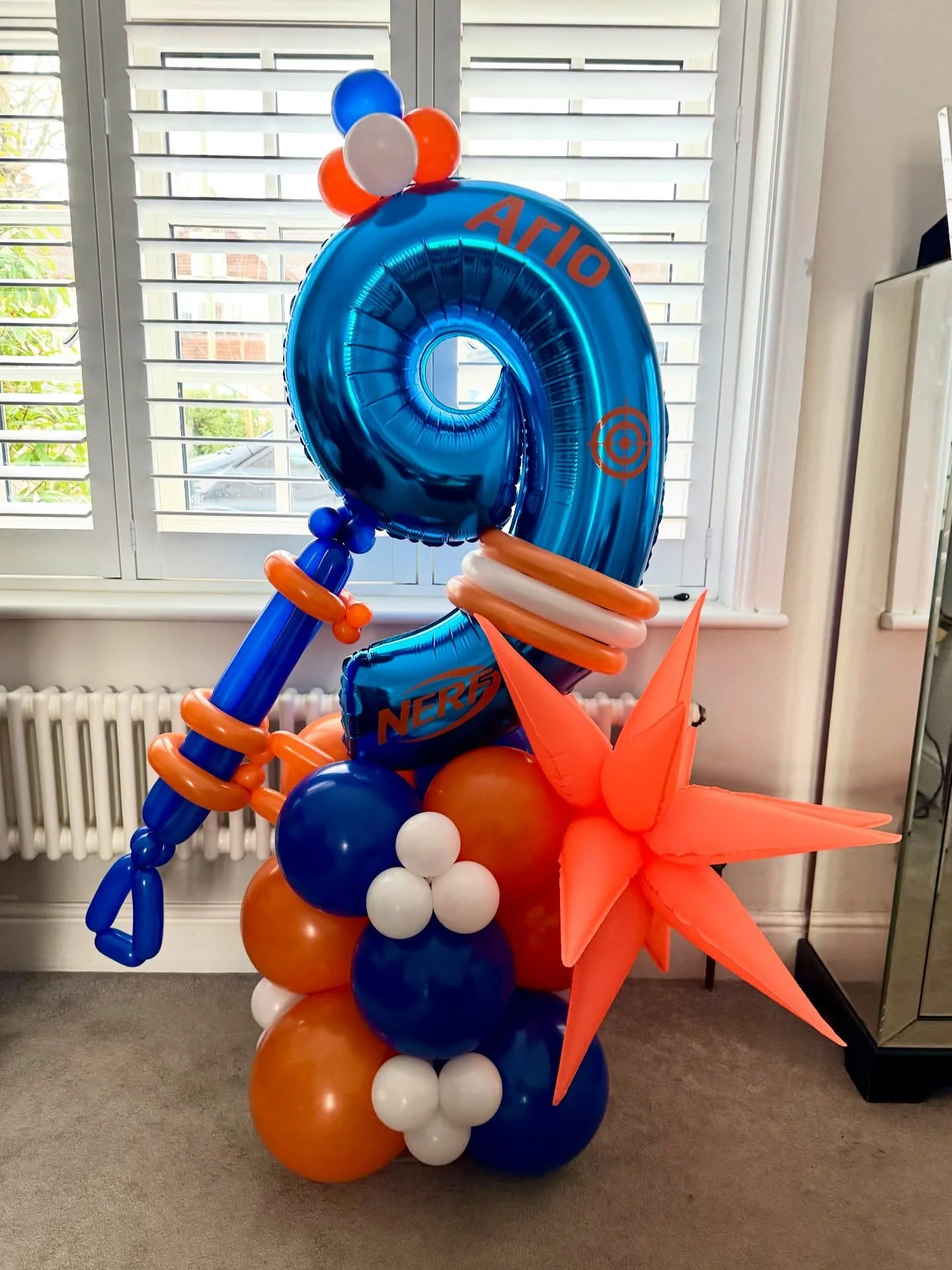 Ready, aim&hellip; CELEBRATE! 🎉

This Nerf-themed stack for Arlo&rsquo;s 9th birthday was SO much fun to make &mdash; bold blues, bright orange and a giant blast to top it all off! 💥

Perfect for any Nerf fans who want their birthday to look as coo