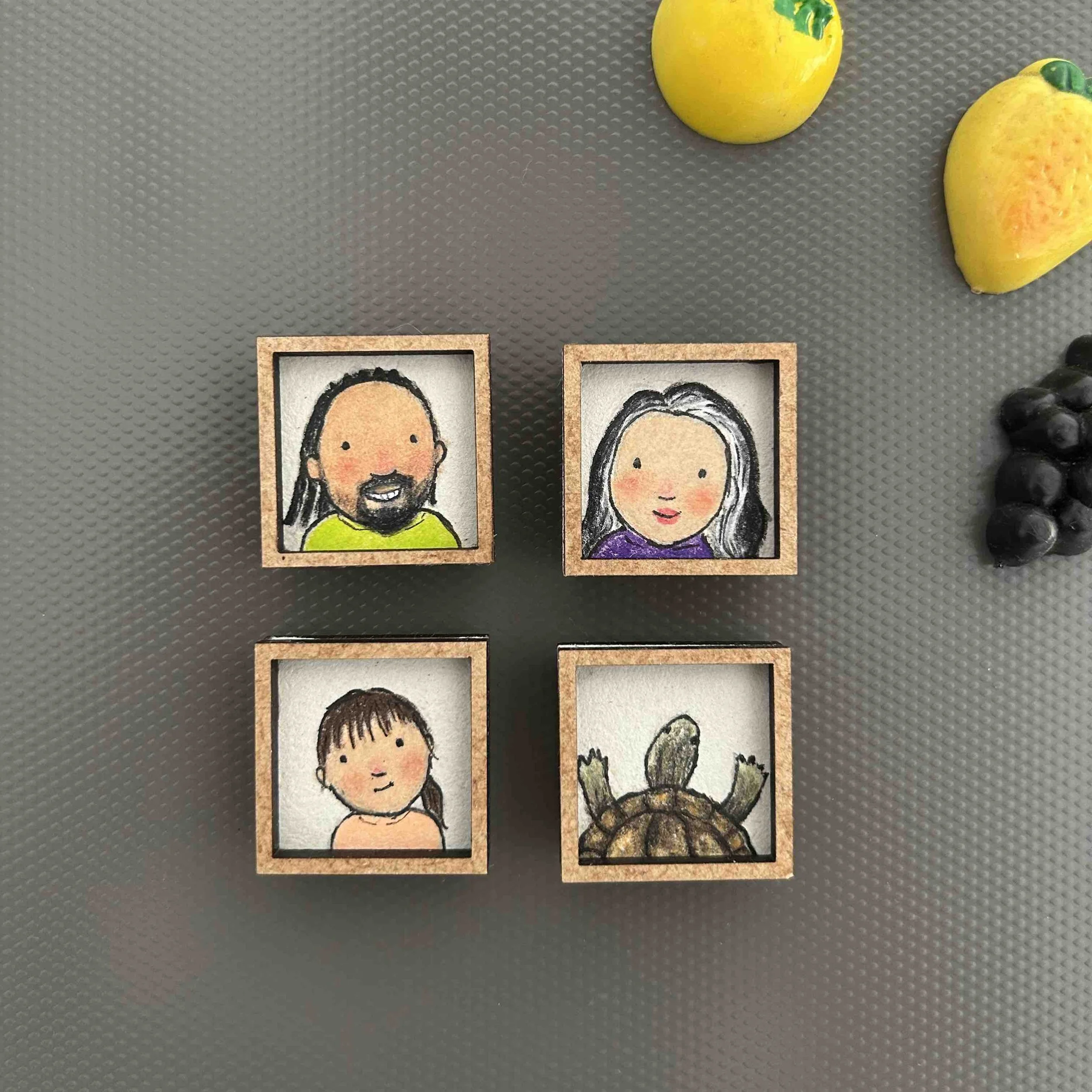 four very tiny portraits