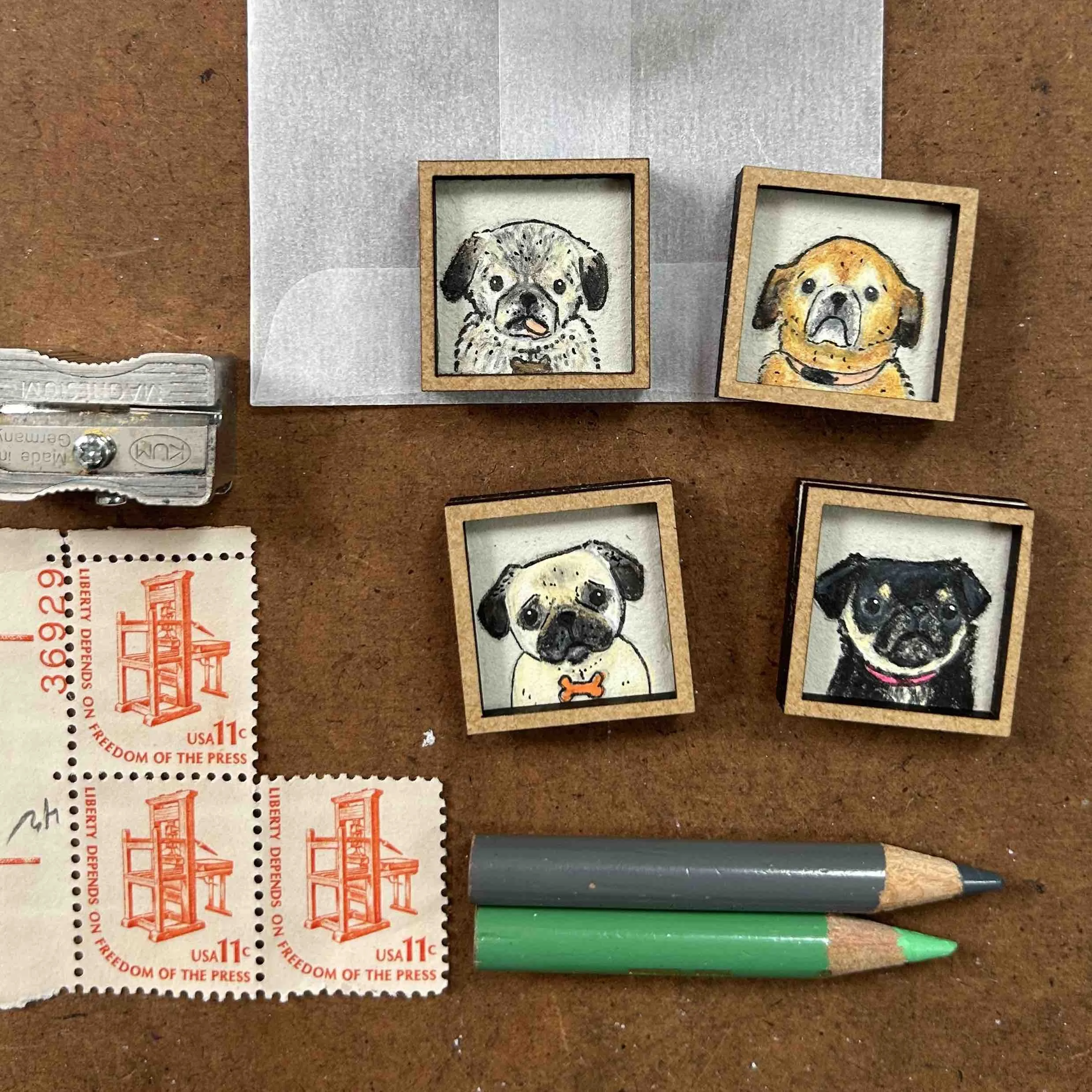 very tiny portraits of cute dogs