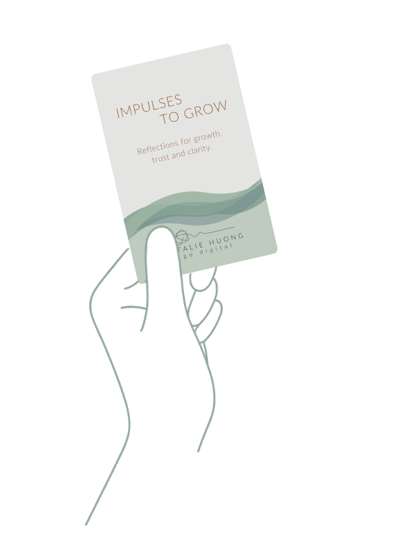 Hand holding an Impulses to Grow card