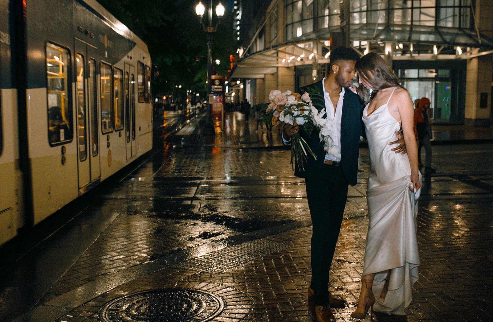 a cool downtown styled wedding featuring a silk slip wedding dress.