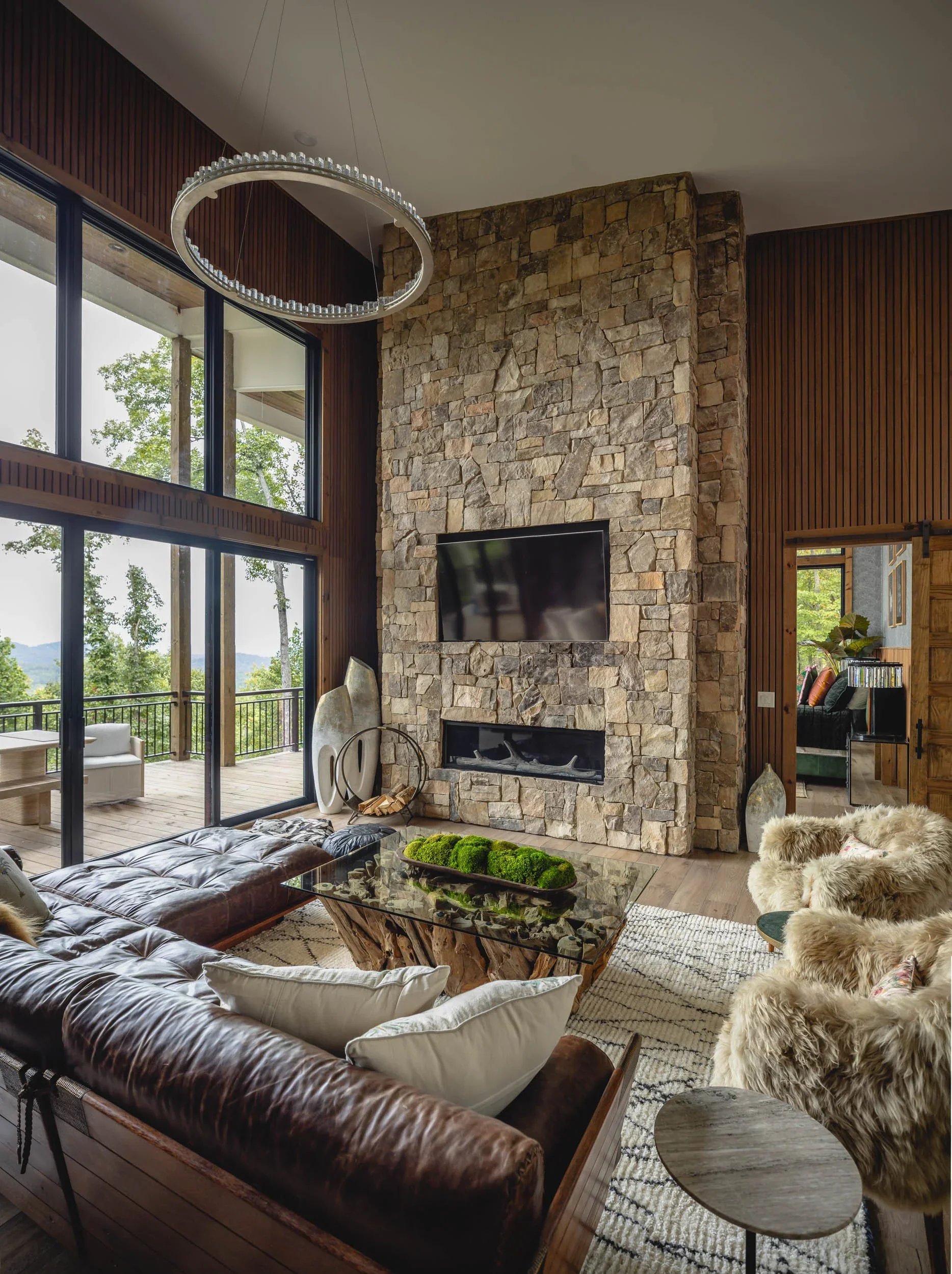 stone-fireplace-living-room-mountain-modern-malibu-home.webp