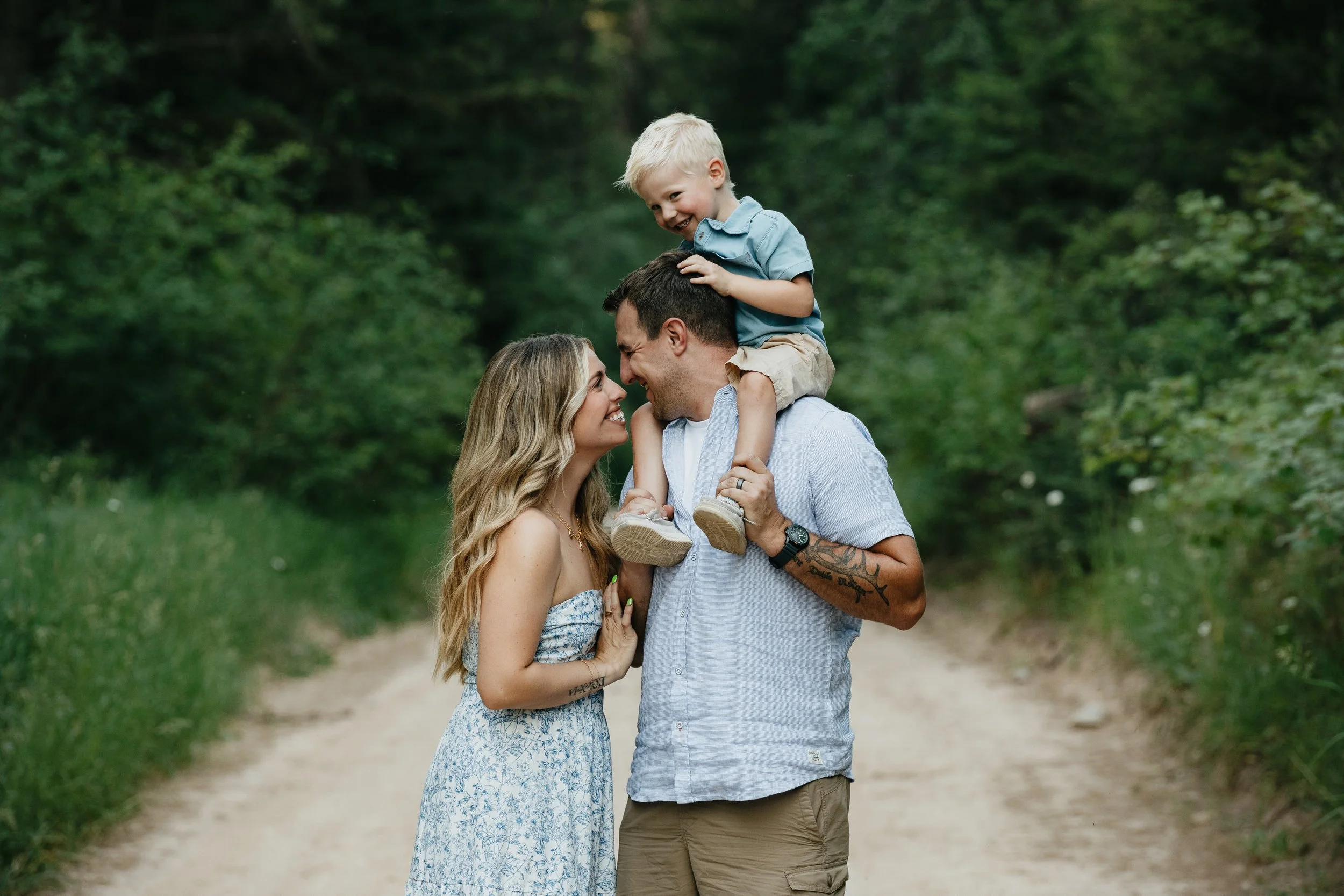 Missoula family photographer capturing families in Montana woods, highlighting laughter, connection, and natural outdoor moments.