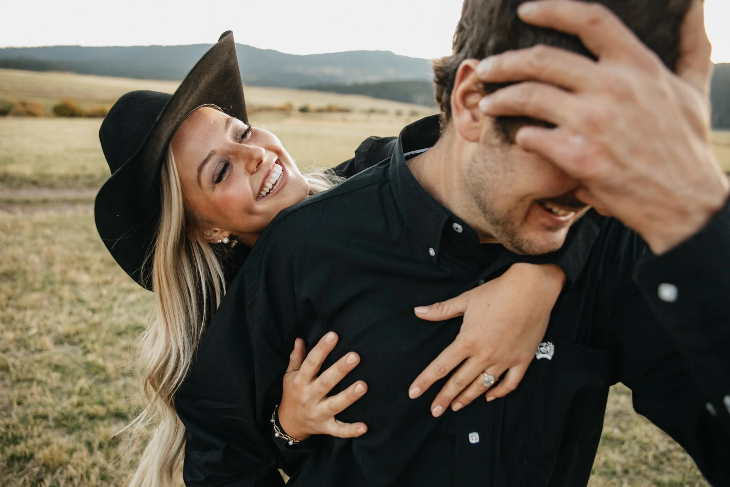 Western-themed engagement session in Helena, Montana showcasing real connection, rustic landscapes, and natural light for couples.
