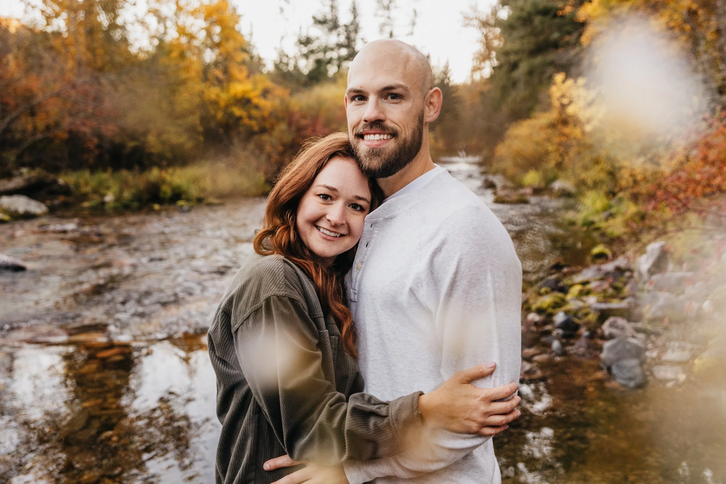 Engagement photography in the forests of Montana and Missoula, focused on natural moments, emotional storytelling, and authentic connection.