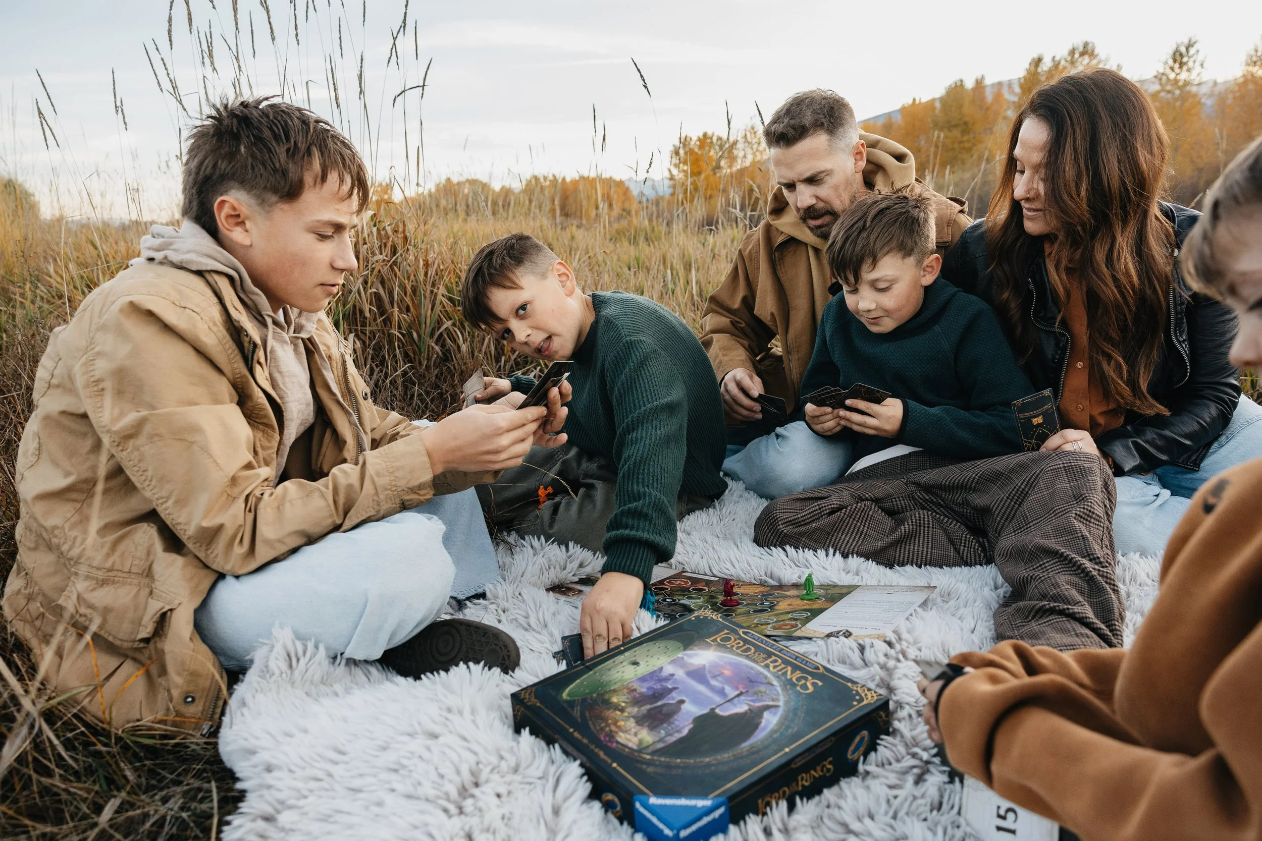 Montana family photographer offering Fall family sessions in Missoula, creating candid, timeless photos surrounded by autumn scenery.