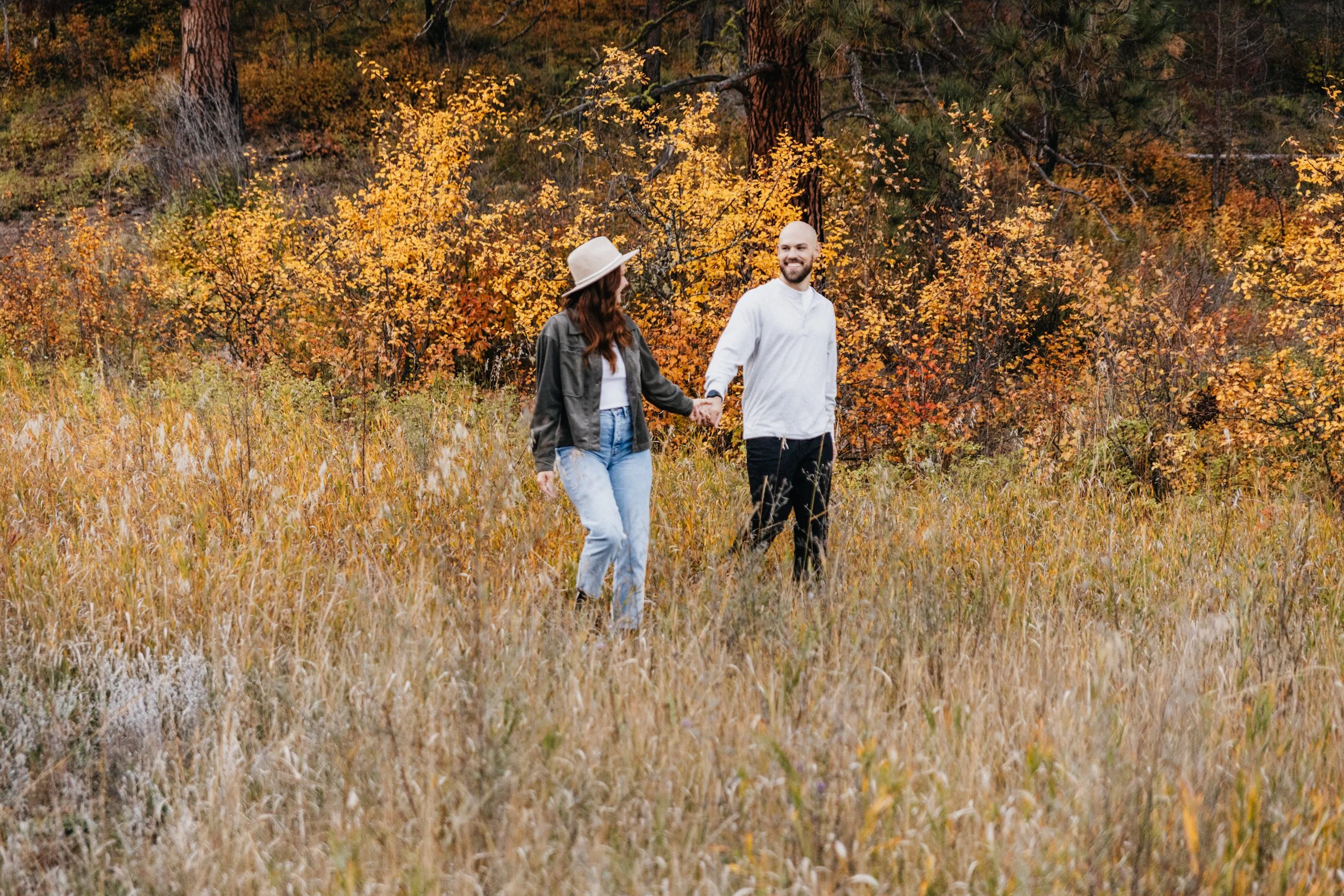 Montana forest engagement photos for couples who love earthy tones, cozy moments, and natural landscapes without forced posing.