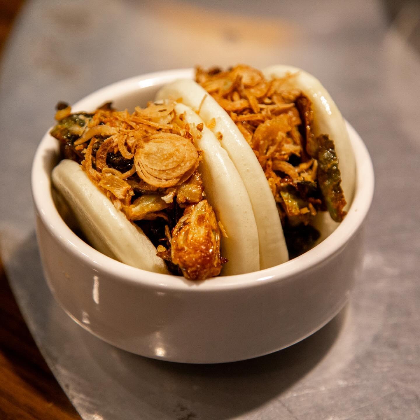 What to look out for at MONEYGUN this week 👀

Our continued food pop-up with @fafo_chicago! If you haven&rsquo;t stopped by to enjoy, what are you doing?! Enjoy shareable like Bao Buns ( Fried Brussels Sprout pictured), Deviled Eggs, or handhelds li