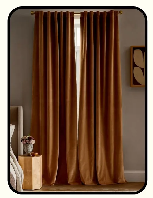 Quince cotton velvet blackout curtains in a warm rust tone