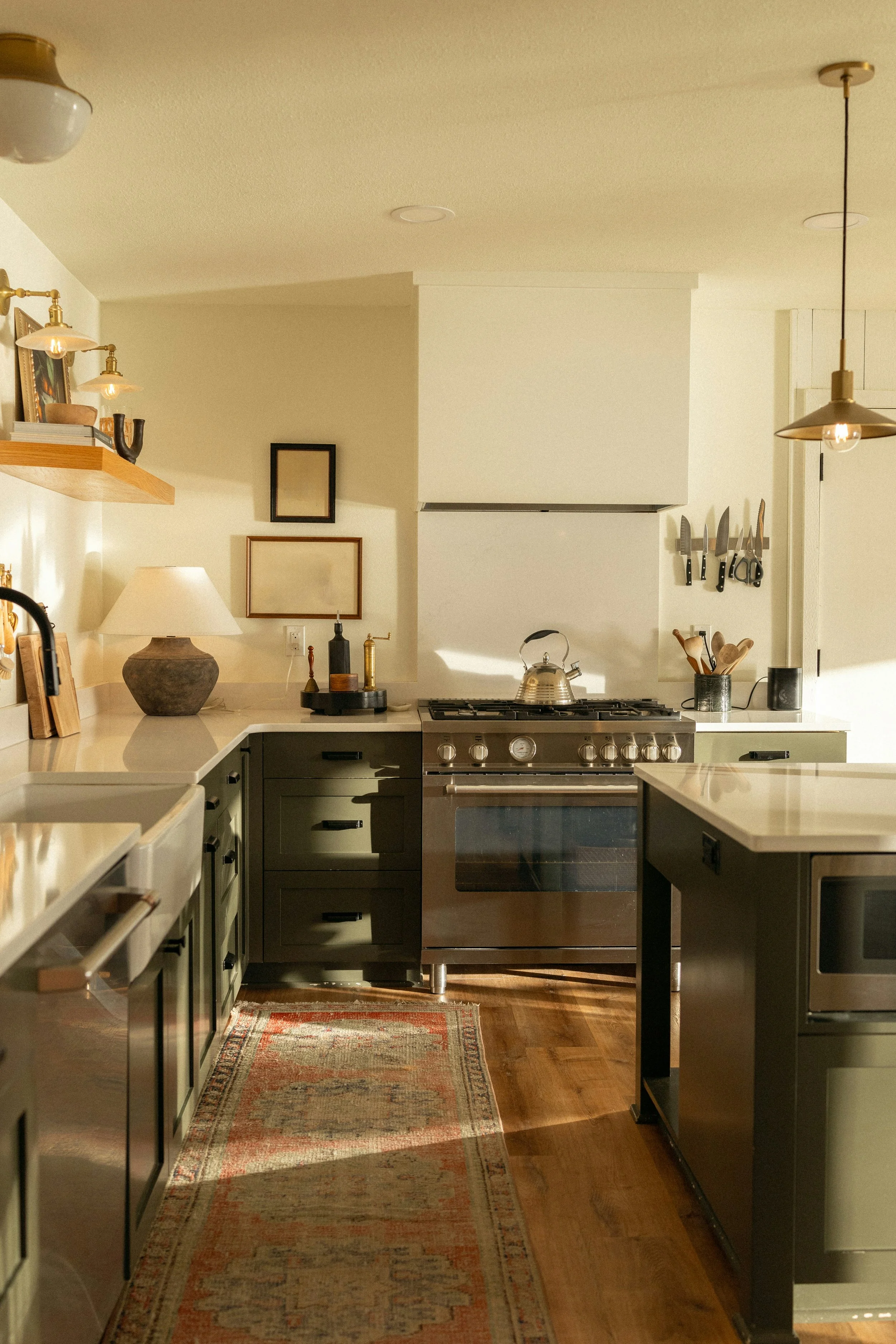 sunlit kitchen with stove and oven