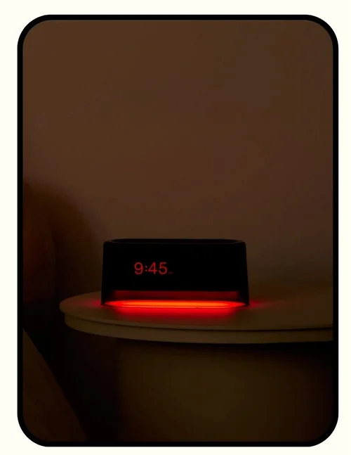 Loftie sunrise alarm clock in red shell with simulated sunrise wake-up light