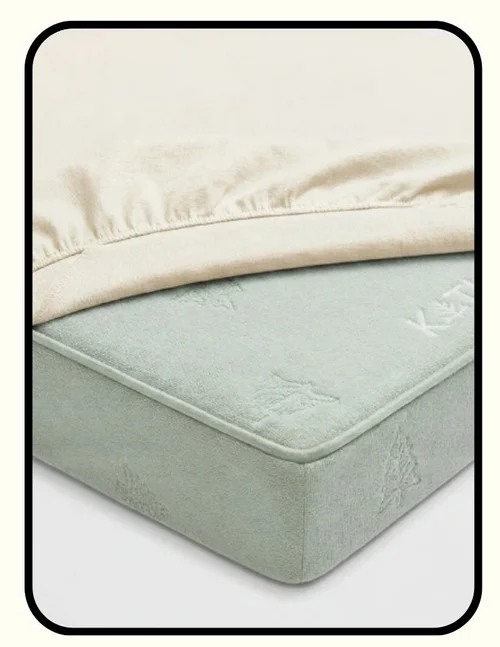 KATU dual-firmness organic crib mattress with GOLS latex, coconut coir, and GOTS fabric