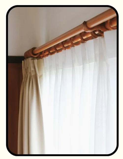 Moondream thermal blackout curtains in a neutral tone framing a window