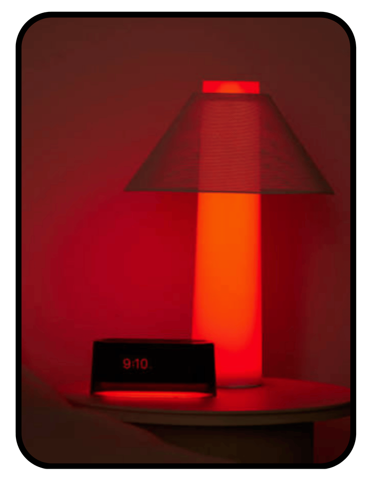 Loftie sunrise alarm clock in red shell with simulated sunrise wake-up light