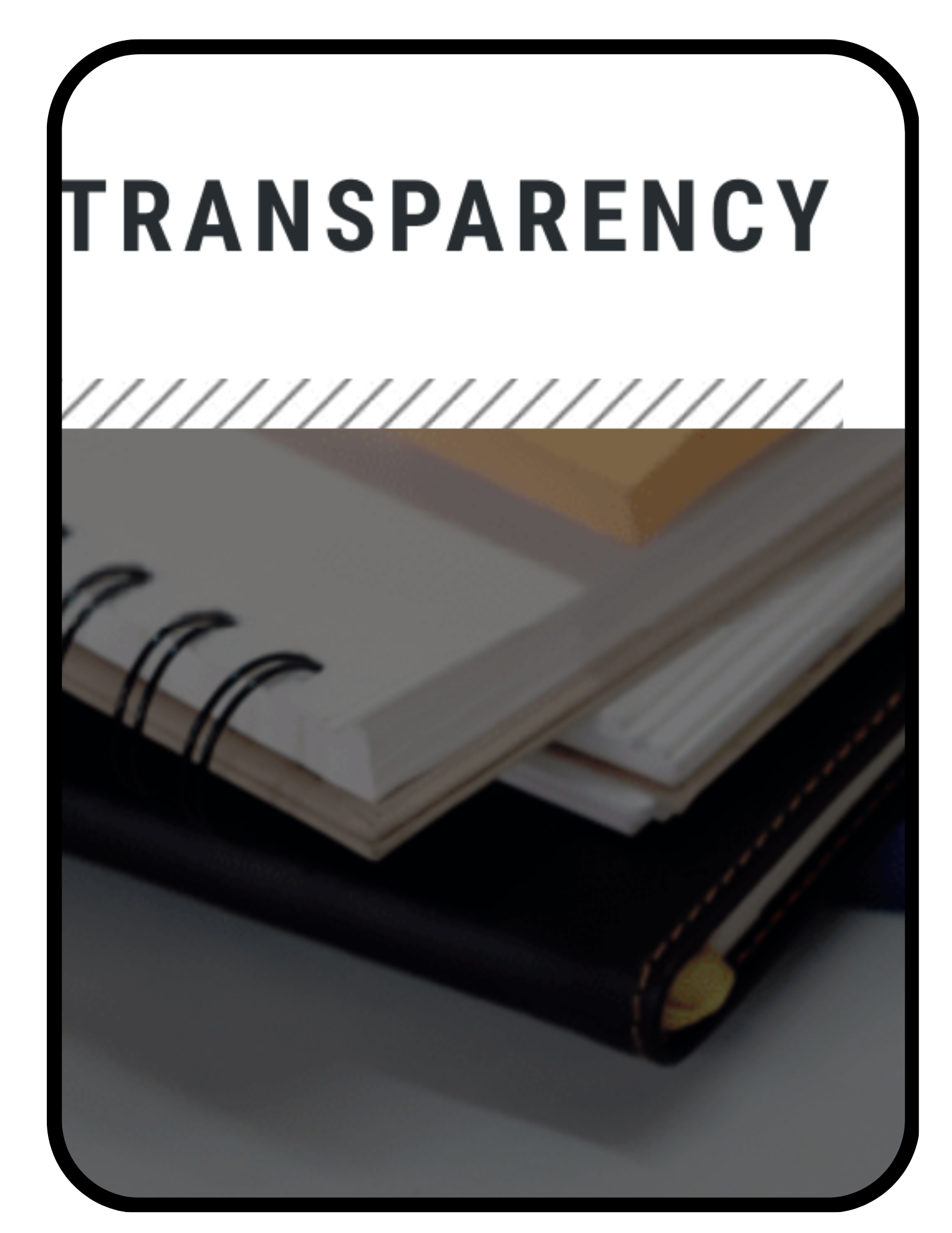 Close-up of multiple notebooks with various cover styles stacked on a white surface