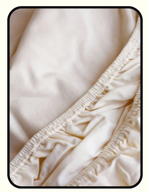 Savvy Rest organic waterproof mattress protector in GOTS certified organic cotton with cornstarch TPU film