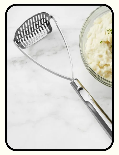 All-Clad uncoated stainless steel non-toxic curved potato masher