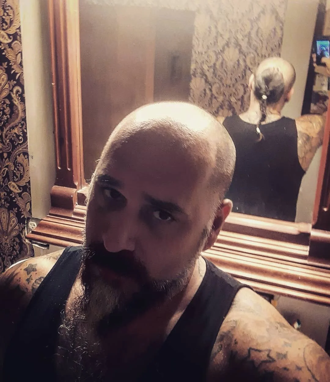 Its too hot to wear my standard newsboy or driver cap. Def too hot for a cowboy hat, so you get to see my secret haircut. Been growin it for cpl yrs.