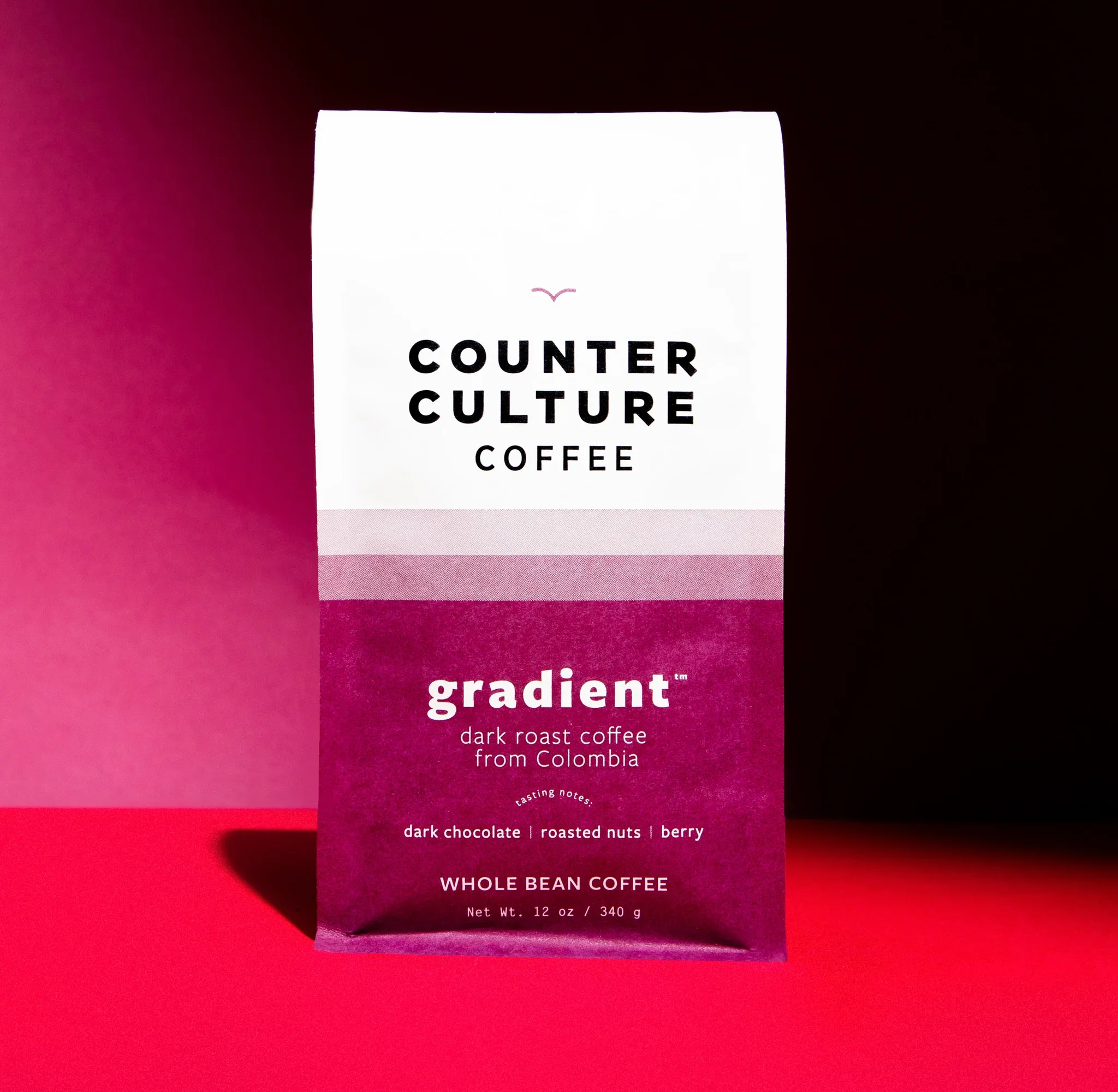 Counter Culture Coffee Gradient dark roast Colombian coffee packaging — magenta pink organic whole bean coffee bag
