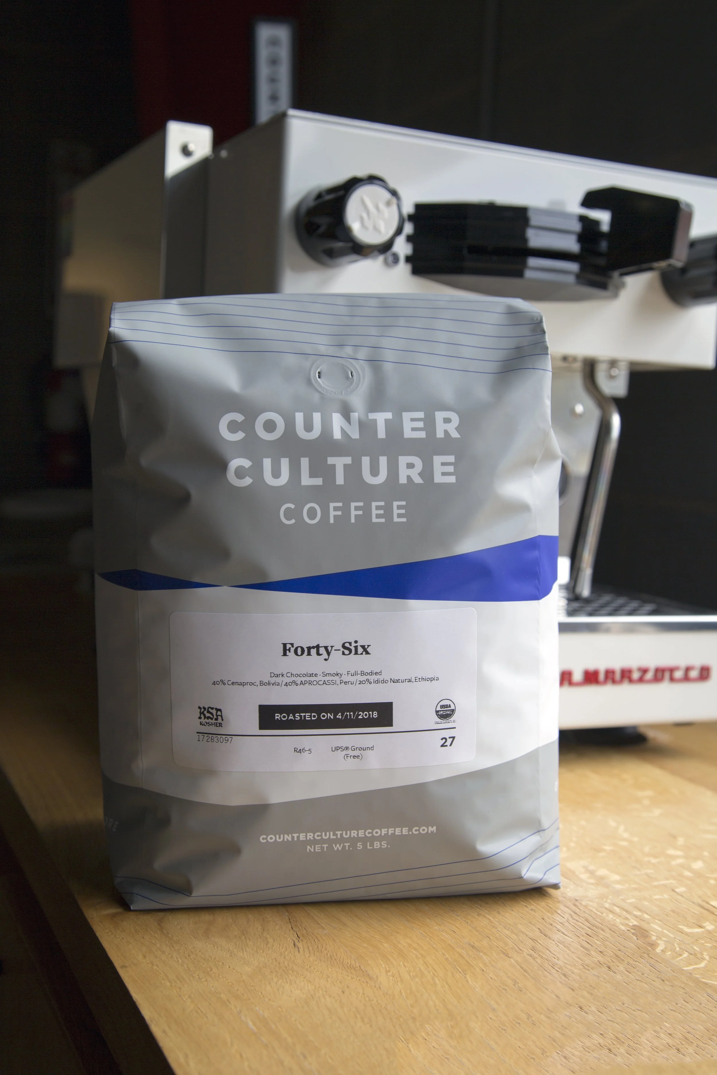 Counter Culture Coffee bulk packaging before redesign — gray 5lb whole bean coffee bag