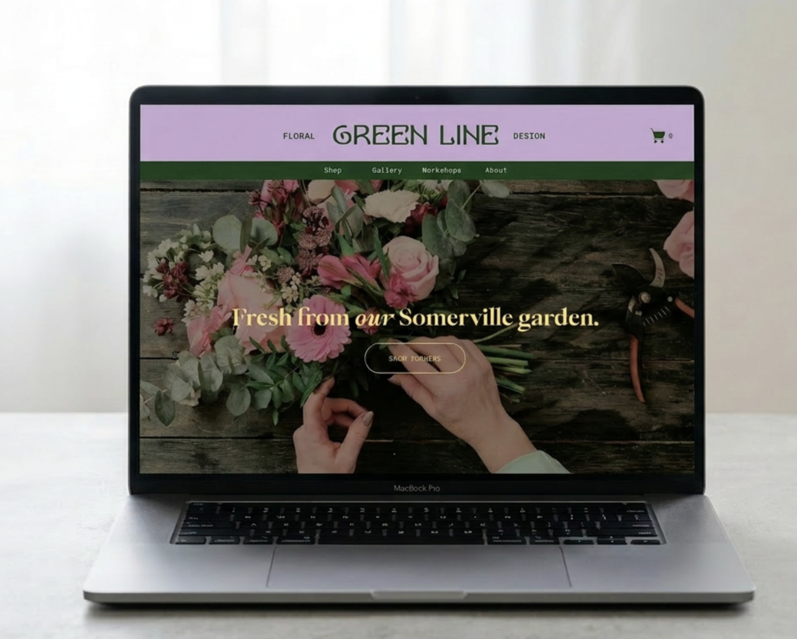 Green Line Floral Design website design on laptop — lavender header with green navigation and floral hero image
