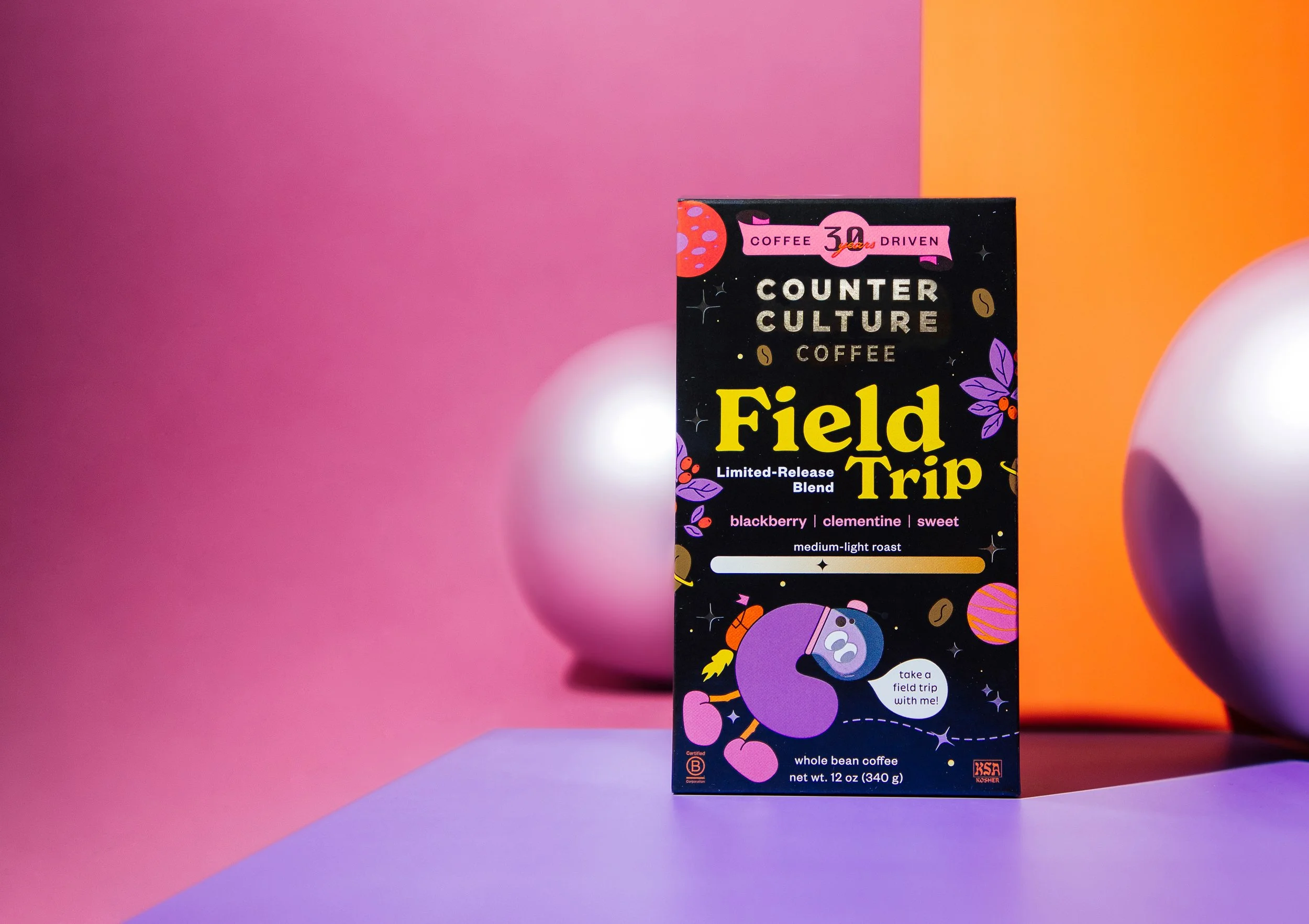Counter Culture Coffee Field Trip seasonal release box — dark packaging with illustrated characters on orange and purple background