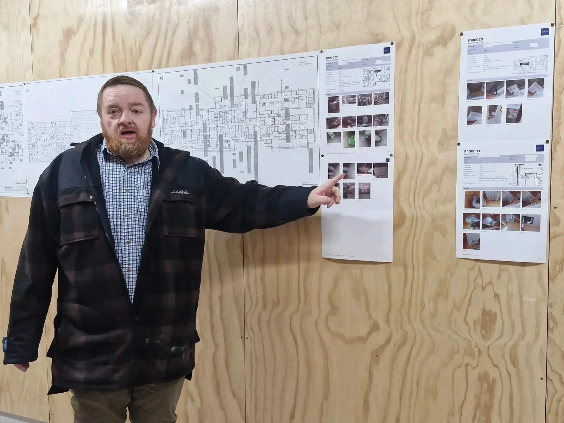 Simon Hemmings pointing to passive Fire Pentrations