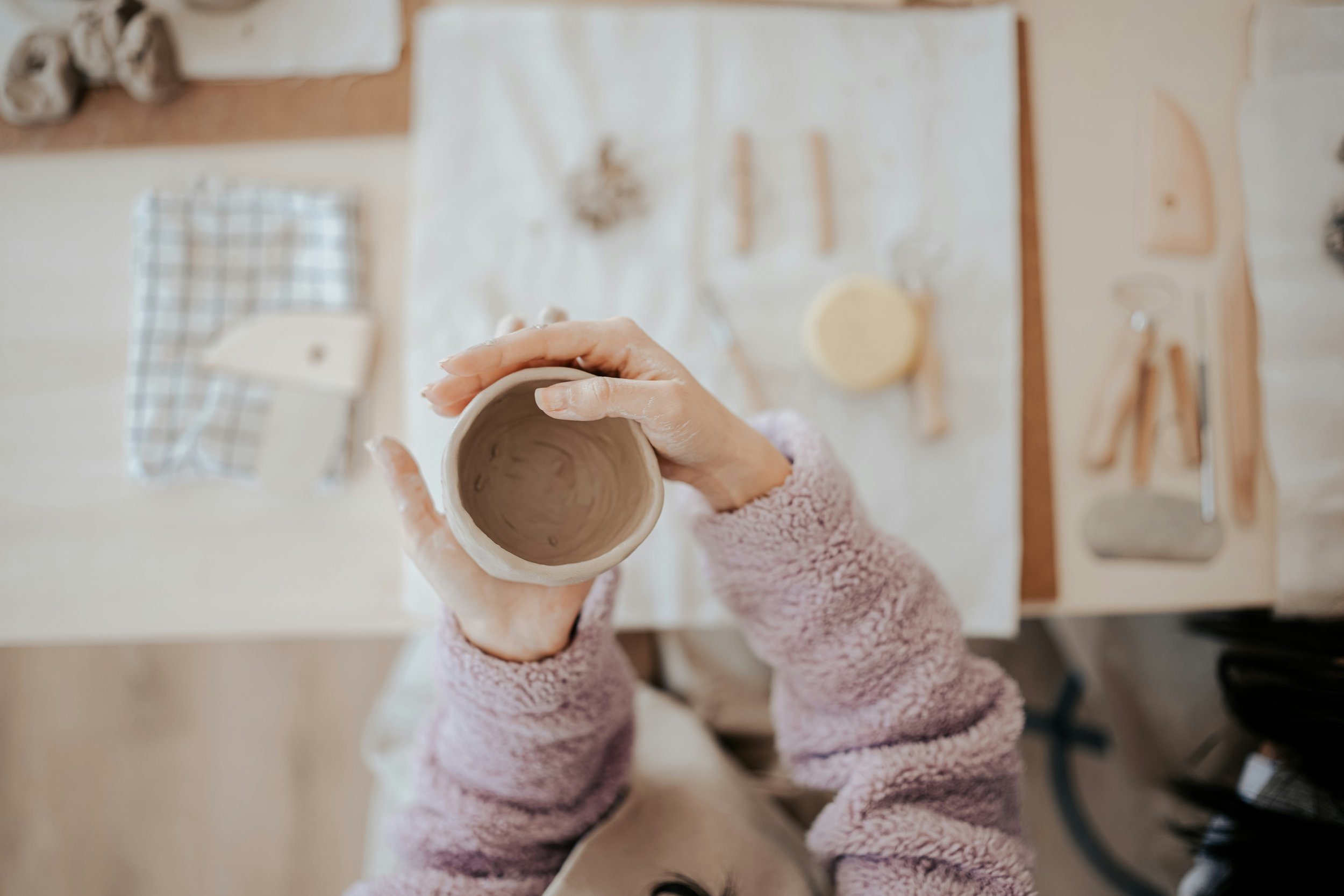 Making a clay hug mug in a workshop with Christie Lange in Tasmania.jpg