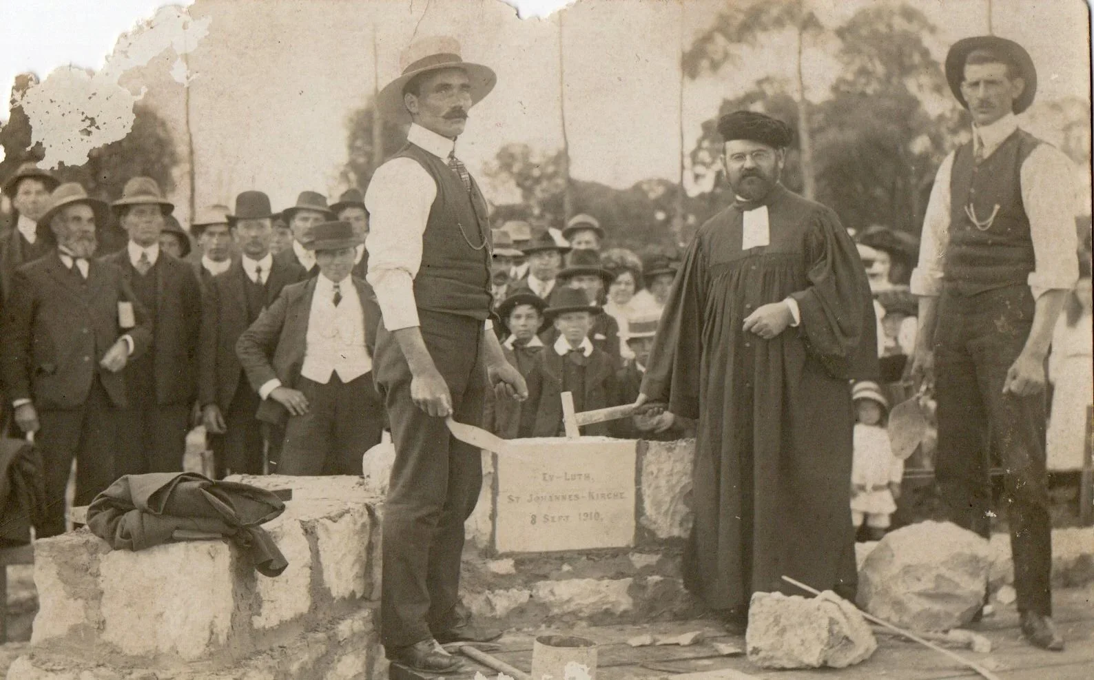 Harry Lange laying a limestone foundation stone in Victoria, Australia