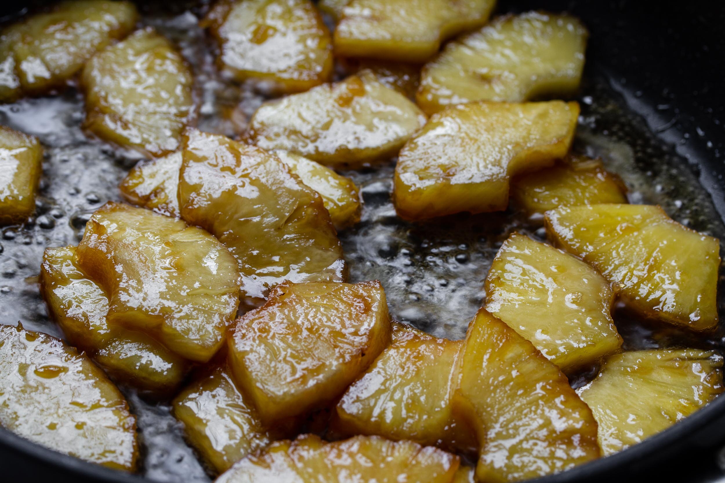  Cook until the fruit releases its juices and the liquid reduces down to a syrup. 
