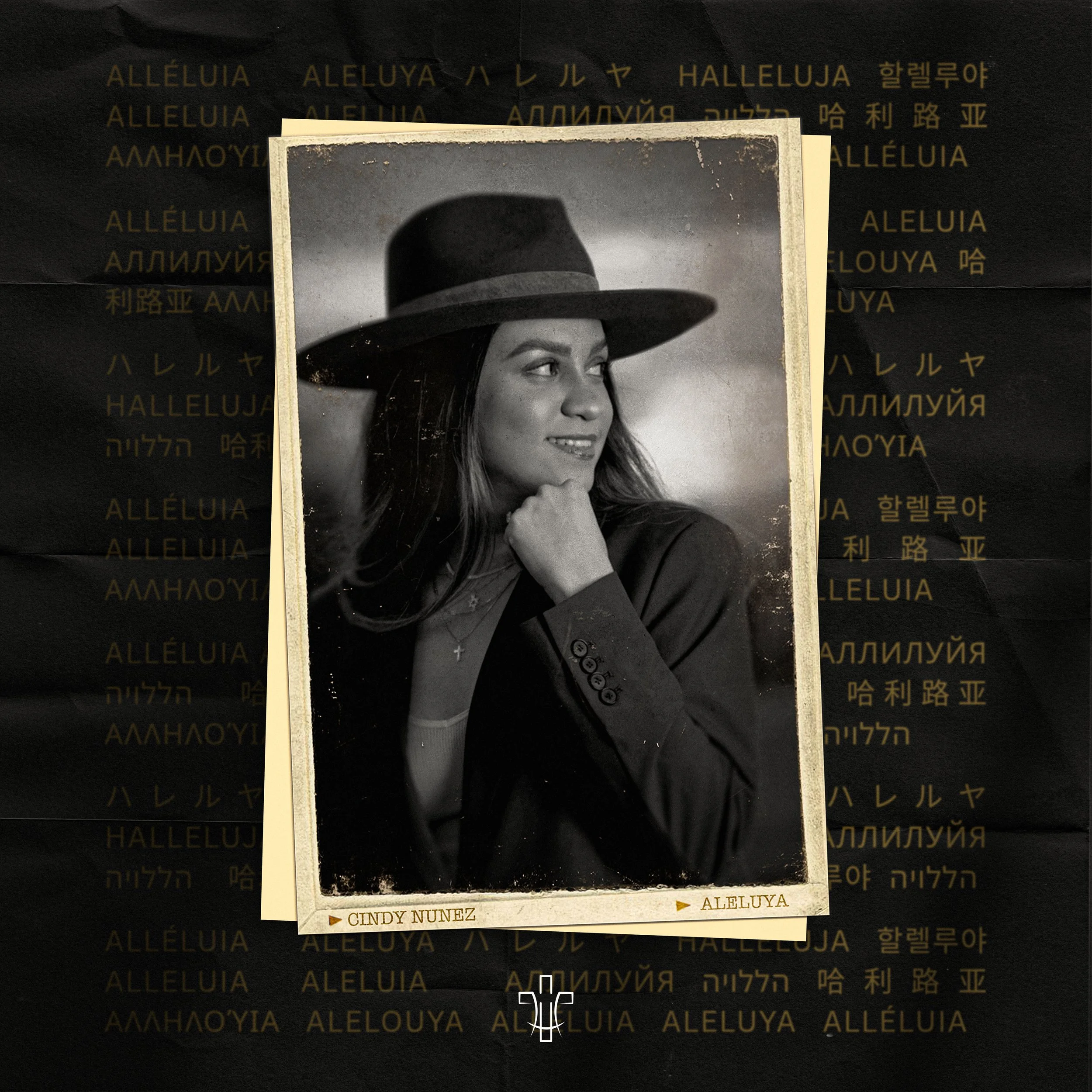 A black and white photograph of a woman with long hair, wearing a large brimmed hat and a coat, smiling and looking to the side. The photograph is bordered and labeled with the name "Cindy Nunez" on the bottom left and "Alleluia" on the bottom right. The background features repeated gold text of the word "ALLELUIA" in multiple languages.