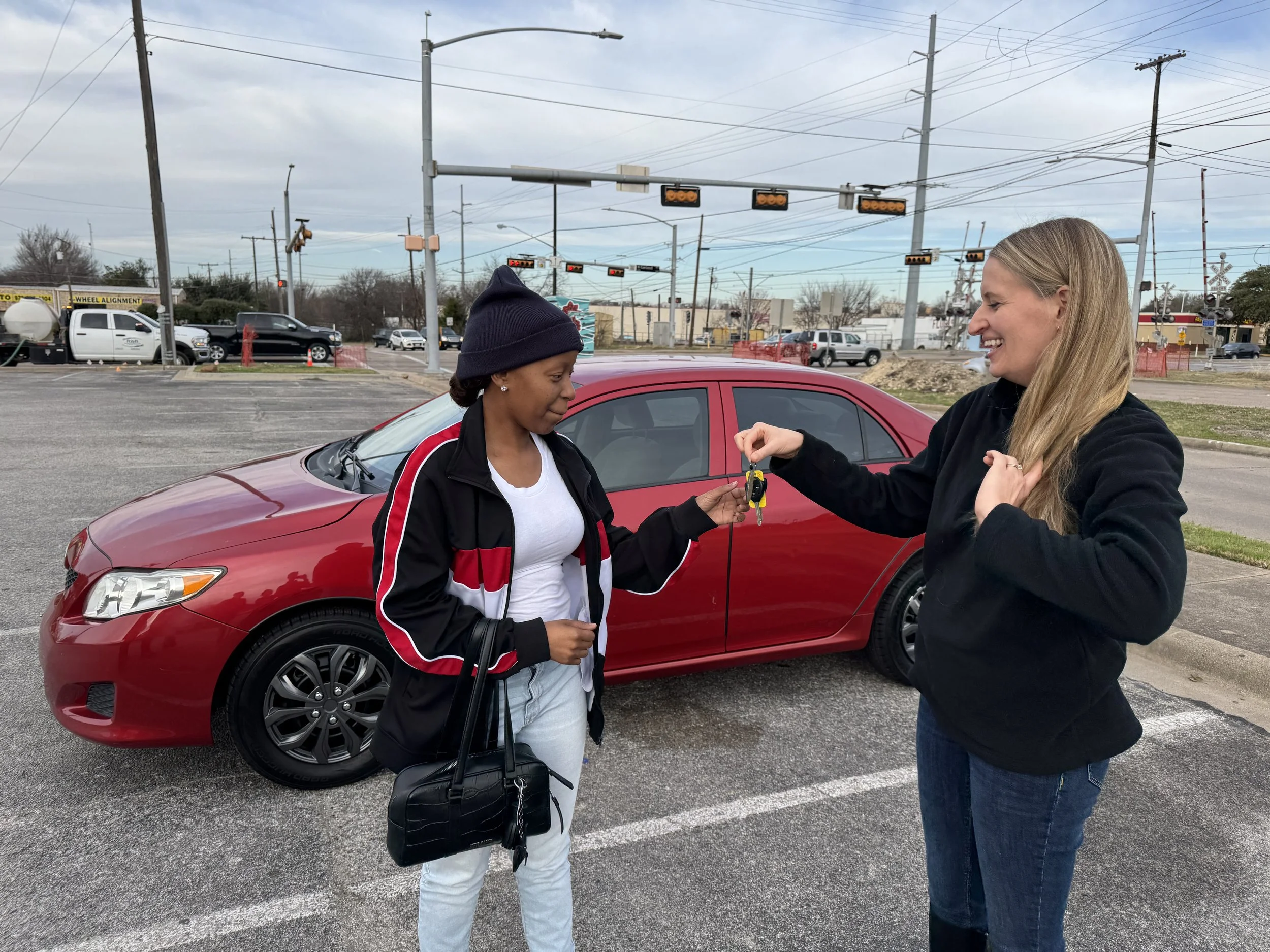 OnRamp DFW Client receives keys to her newly donated car