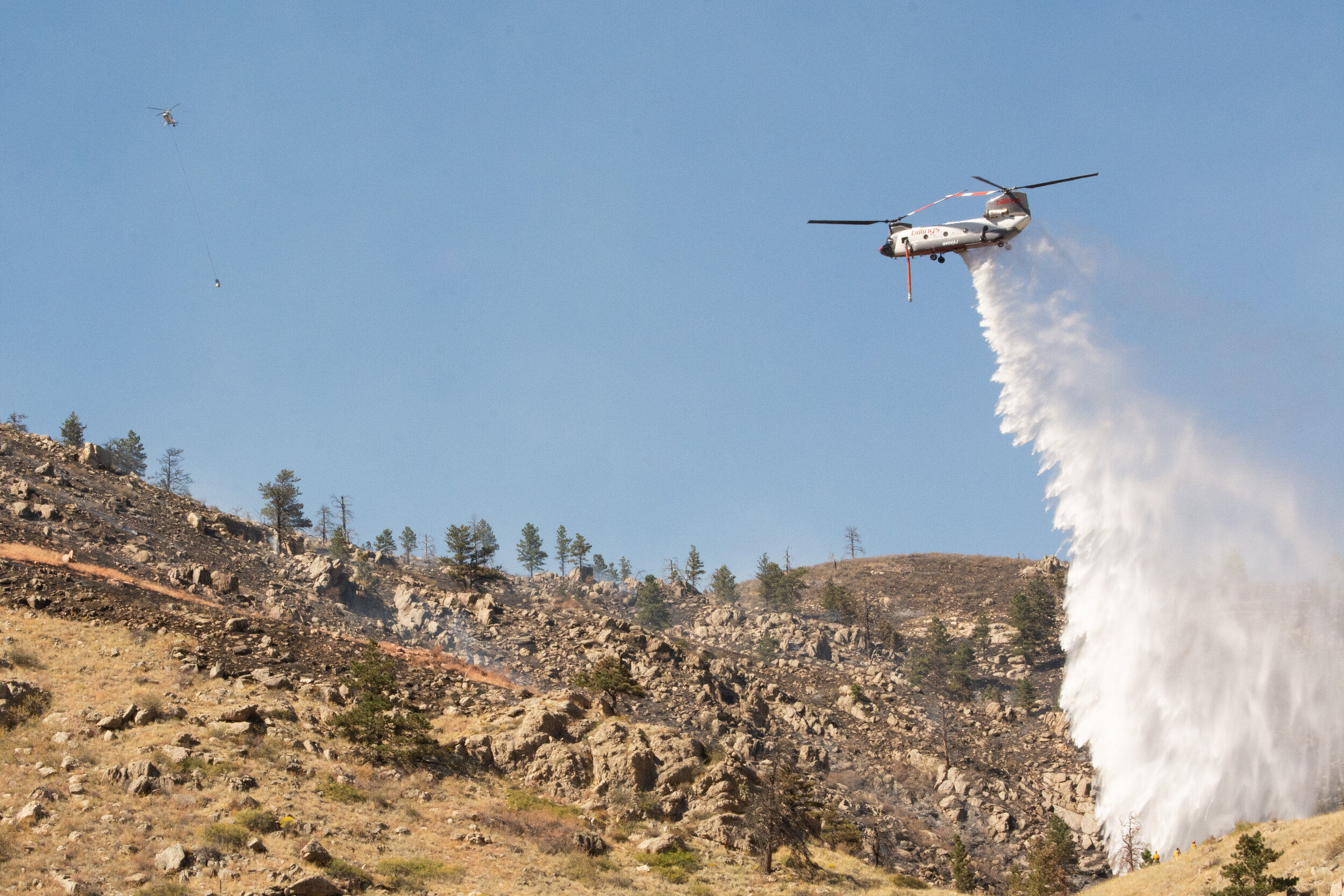 A wildfire that started Tuesday evening near Seaman Reservoir has grown to 139 acres and is now threatening structures near the Poudre River a half-mile away, according to a news release by the United States Forest Service. (Colin Shepherd | The Rock